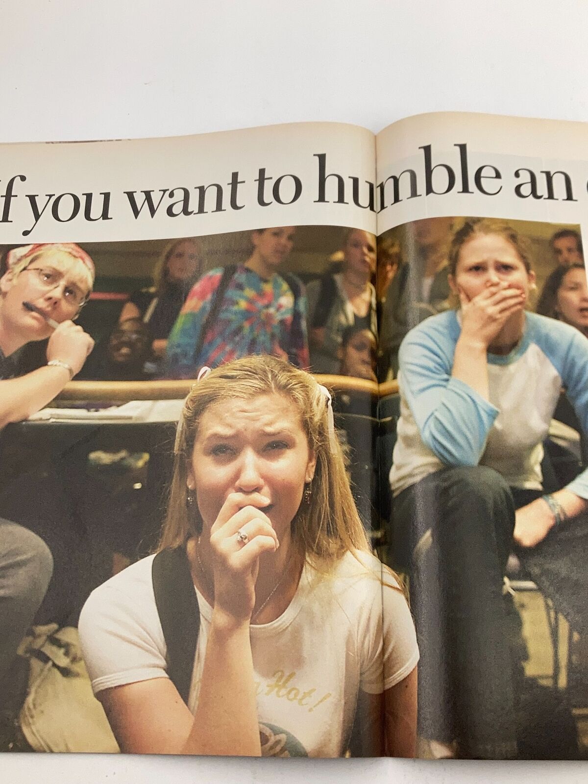 Young people captivated by the news of the September 11 attacks, illustrated in Time Magazine September 11 2001 The Twin Tower Attack 9-11, showcasing their emotional responses.