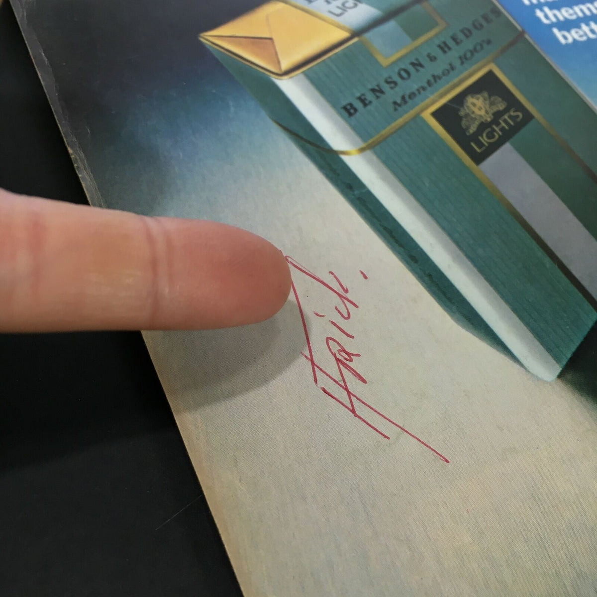 Hand pointing to a signature on an advertisement in VTG Time Magazine April 10 1978, featuring Benson & Hedges cigarettes.