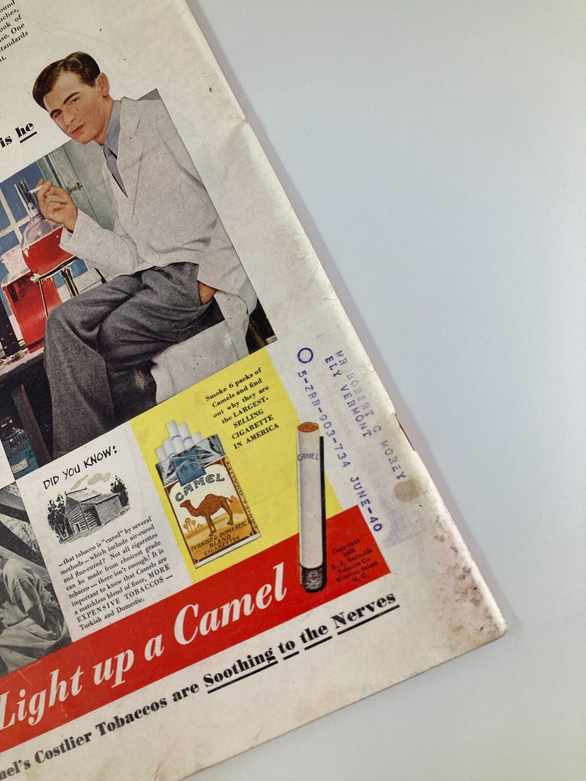 Close-up of the advertisement on the back cover of VTG Time Magazine dated November 21, 1938, featuring a man in a white coat and promoting Camel cigarettes as soothing for nerves.