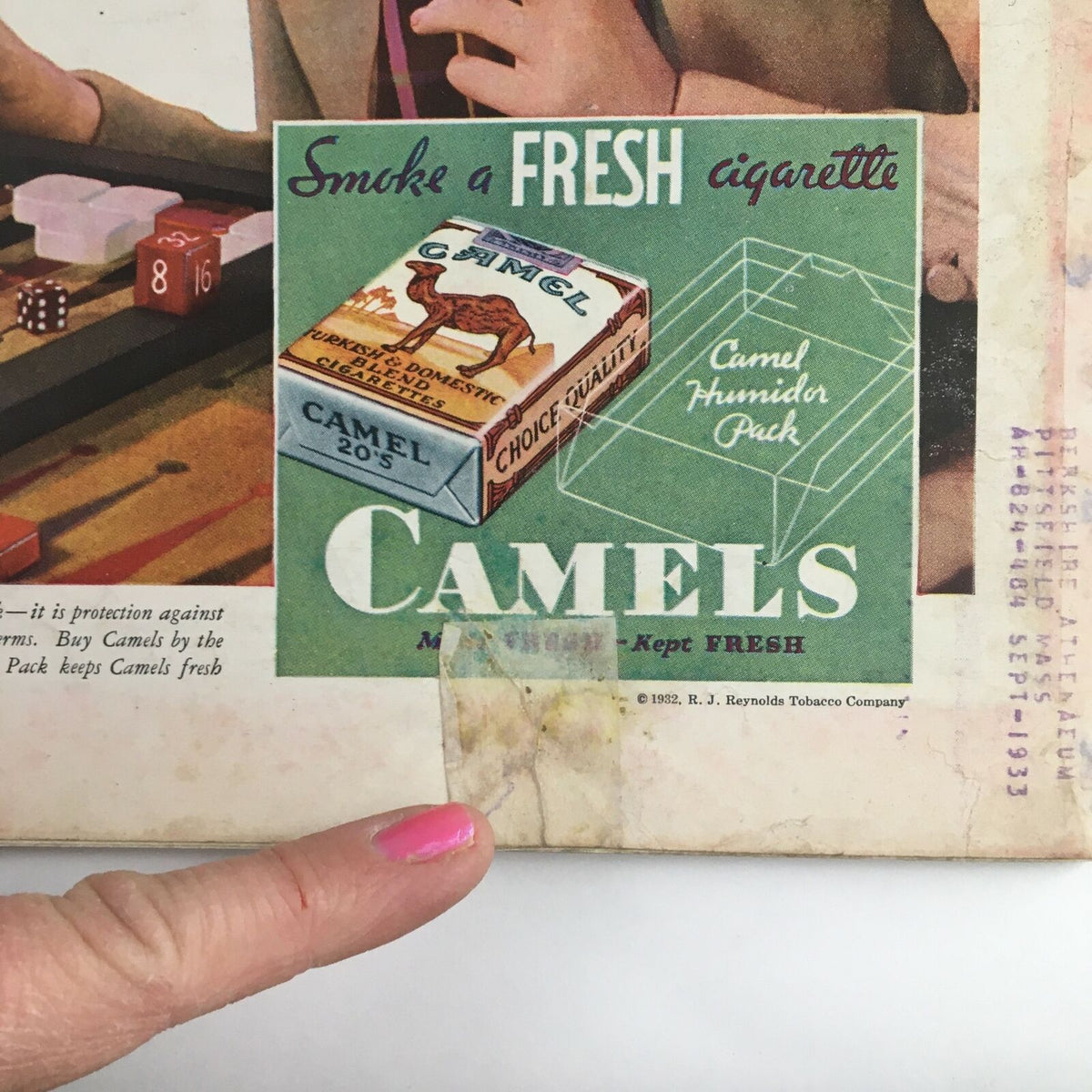 Close-up view of a vintage advert featuring Camel cigarettes from Time Magazine December 5 1932 Vol 20 #23, showcasing the cigarette pack, brand details, and an address label with a slight yellowing, emphasizing the magazine's historical context.
