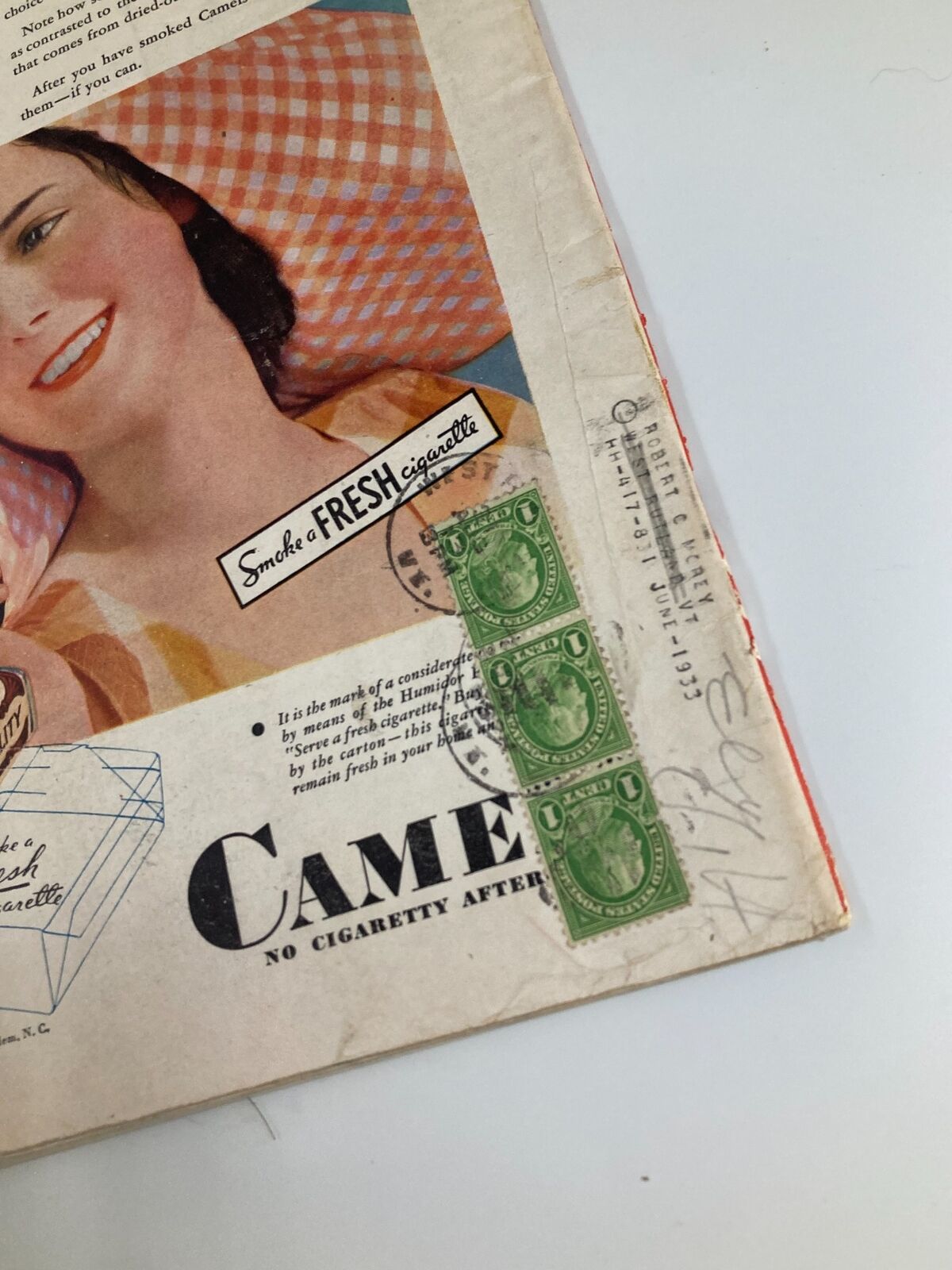 Close-up of the vintage Time Magazine from August 17, 1931, Vol 18 No. 7 titled 'Samuel Seabury Spies a Wigwam,' featuring an advertisement for Camel cigarettes and a vintage postage stamp highlighting its retro design.