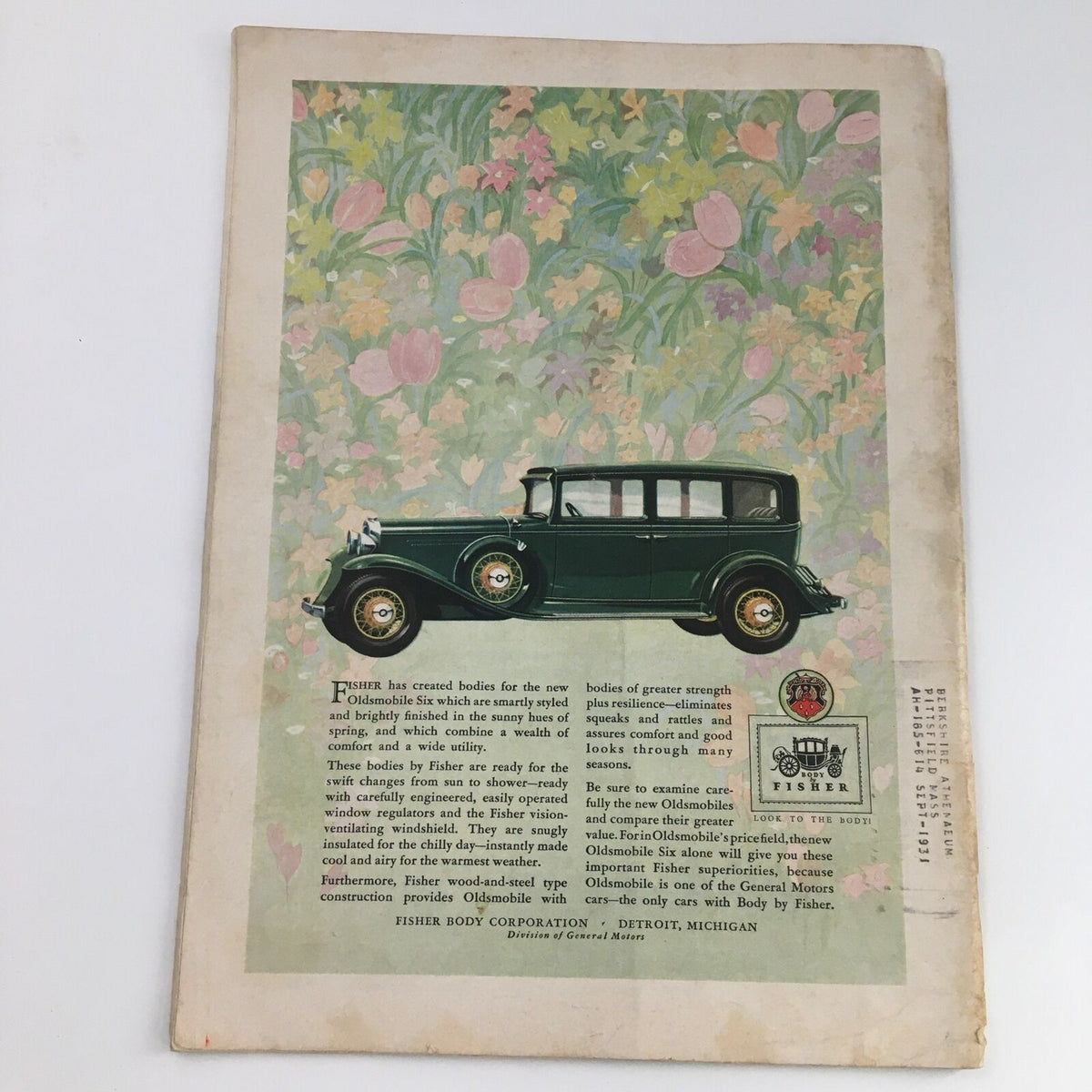 Back cover of Time Magazine from April 6, 1931, highlighting an advertisement for the Oldsmobile Six, adorned with floral artwork, reflecting the style of the era.