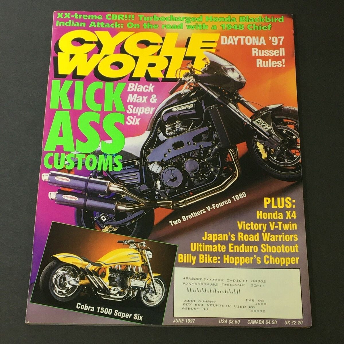 Cycle World Magazine June 1997 cover featuring Cobra 1500 Super Six and Two Brothers V-Fource 1680. The vibrant magazine cover showcases a black motorcycle alongside the yellow Cobra 1500, with bold text reading 'KICK ASS CUSTOMS'.