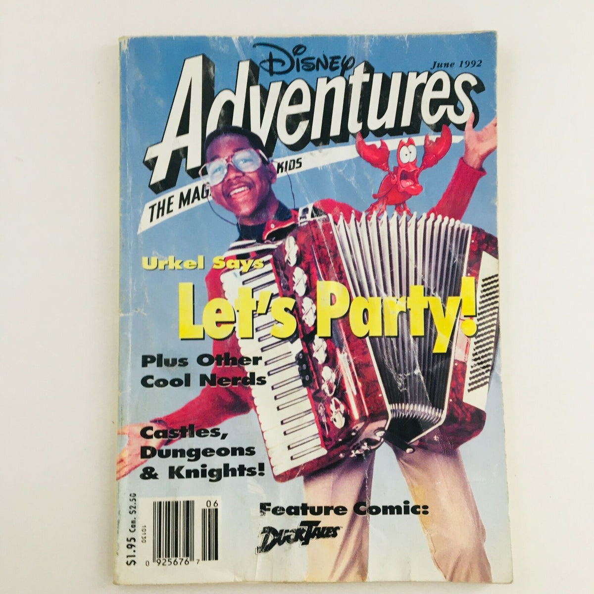 Cover of Disney Adventures Magazine June 1992 featuring Jaleel White as Urkel with accordion, vibrant colors and playful design, emphasizing family fun and pop culture.