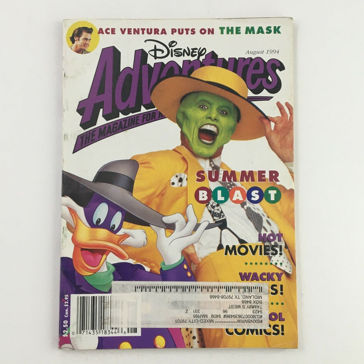 Disney Adventures Magazine from August 1994 featuring Ace Ventura and The Mask. The cover showcases Jim Carrey in a vibrant green costume, portraying The Mask, alongside a cartoon character resembling Donald Duck. This vintage magazine captures the humor and entertainment of the 1990s.