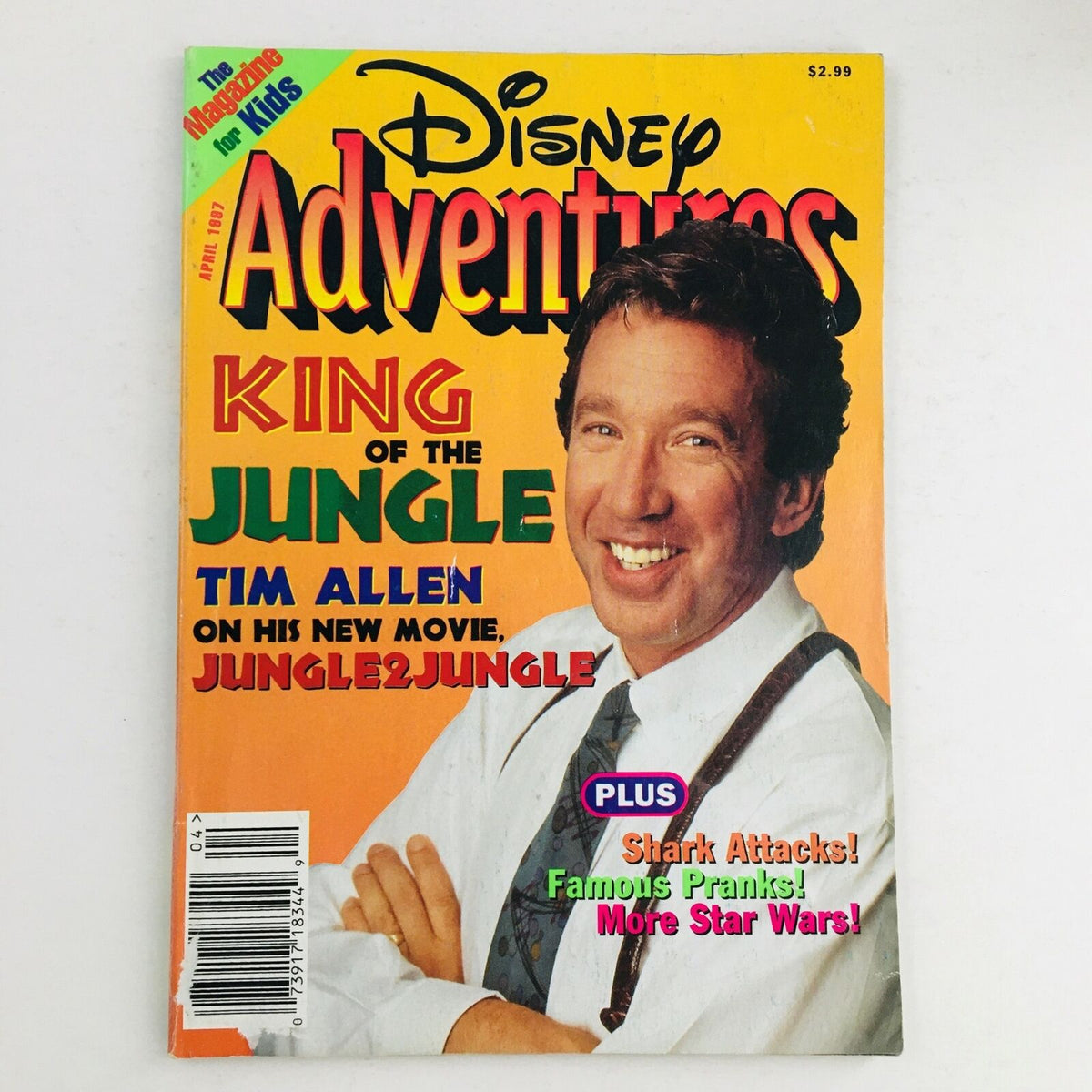 Disney Adventures Magazine April 1997 featuring Tim Allen on the cover in a 'King of the Jungle' theme, showcasing vibrant colors and promotional highlights for his movie 'Jungle2Jungle'.