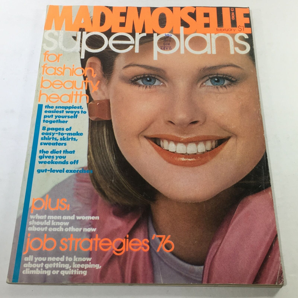 Cover of VTG Mademoiselle Magazine: February 1976 featuring a smiling woman showcasing fashion, beauty, and health themes.