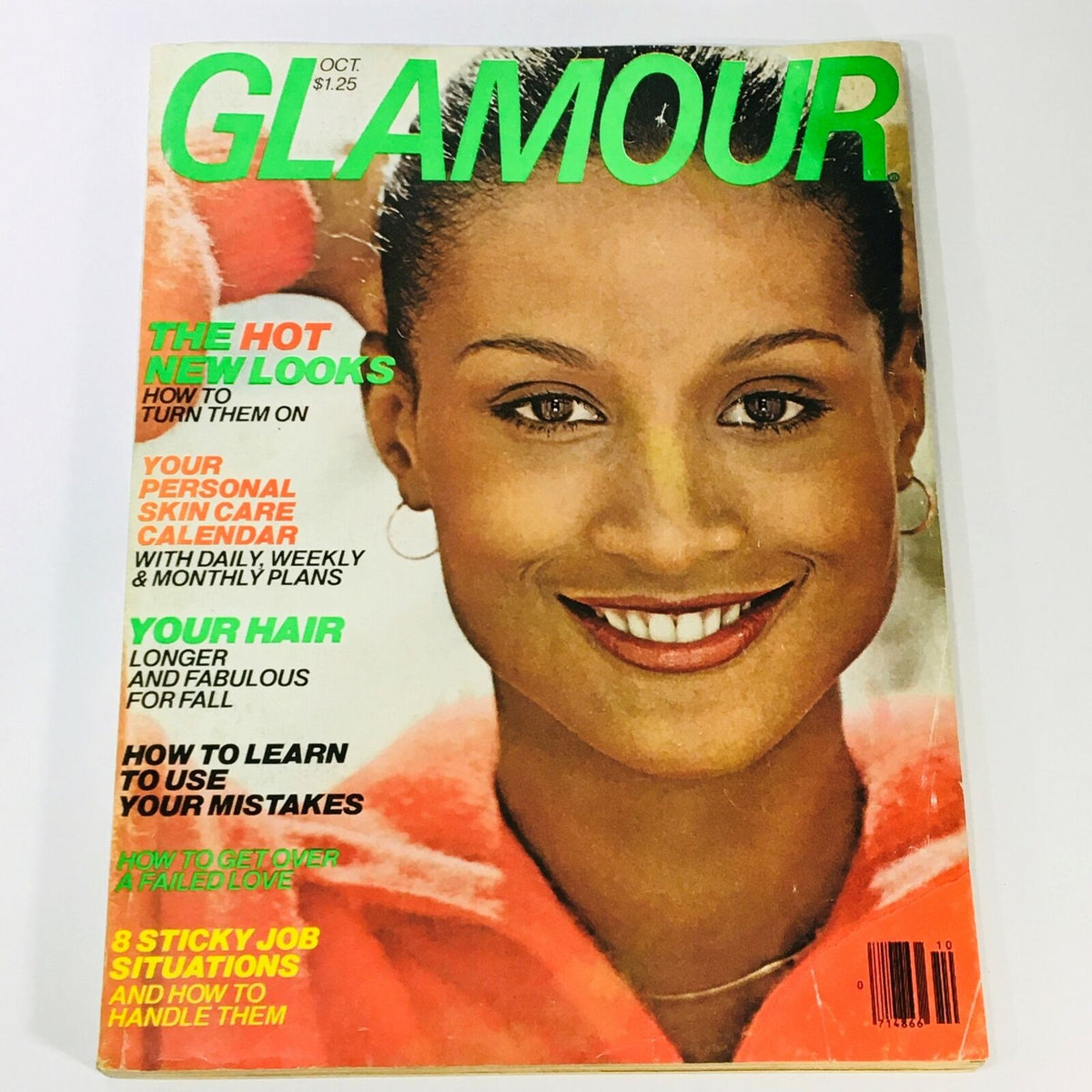Cover of Glamour Magazine, October 1977 featuring Beverly Johnson. The magazine showcases vibrant fashion themes with headlines like 'The Hot New Looks,' 'Your Personal Skin Care Calendar,' 'Your Hair,' and '8 Sticky Job Situations.' This vintage magazine captures the fashion and social culture of the late 1970s.