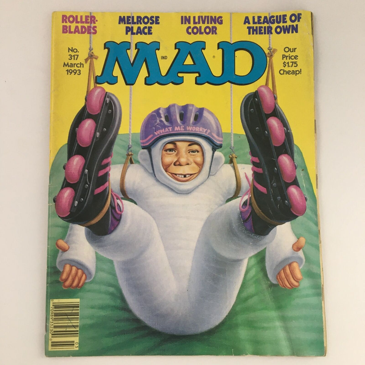 Mad Magazine March 1993 #317 cover featuring a whimsical illustration of a character rollerblading, showcasing vibrant colors and humorous text, ideal for vintage magazine collectors.