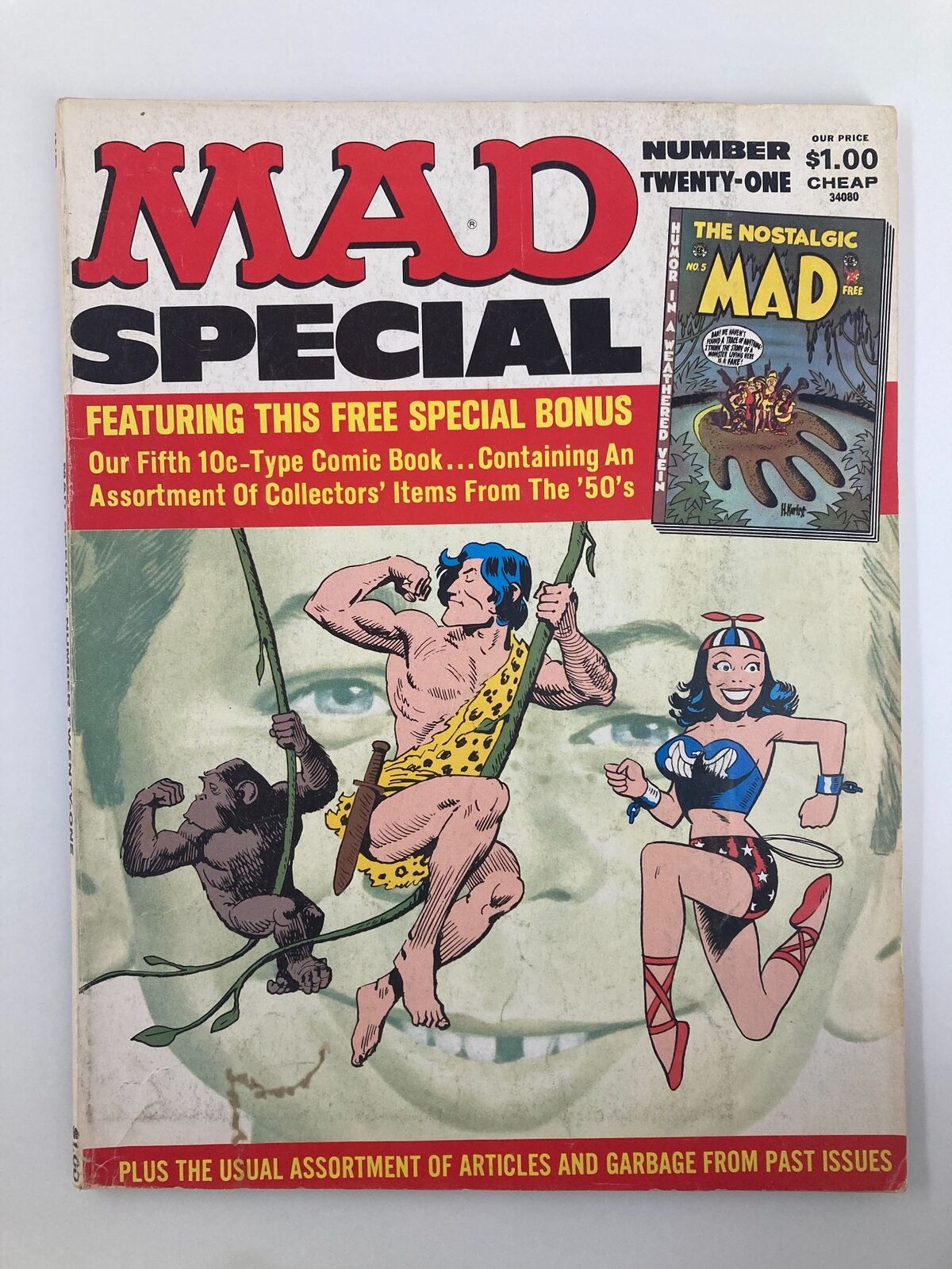 Cover of Mad Special Magazine 1976 No. 21 featuring Tarzan and Wonder Woman, showcasing iconic characters in vibrant artwork. This fine condition issue is a collectible for comic book enthusiasts.