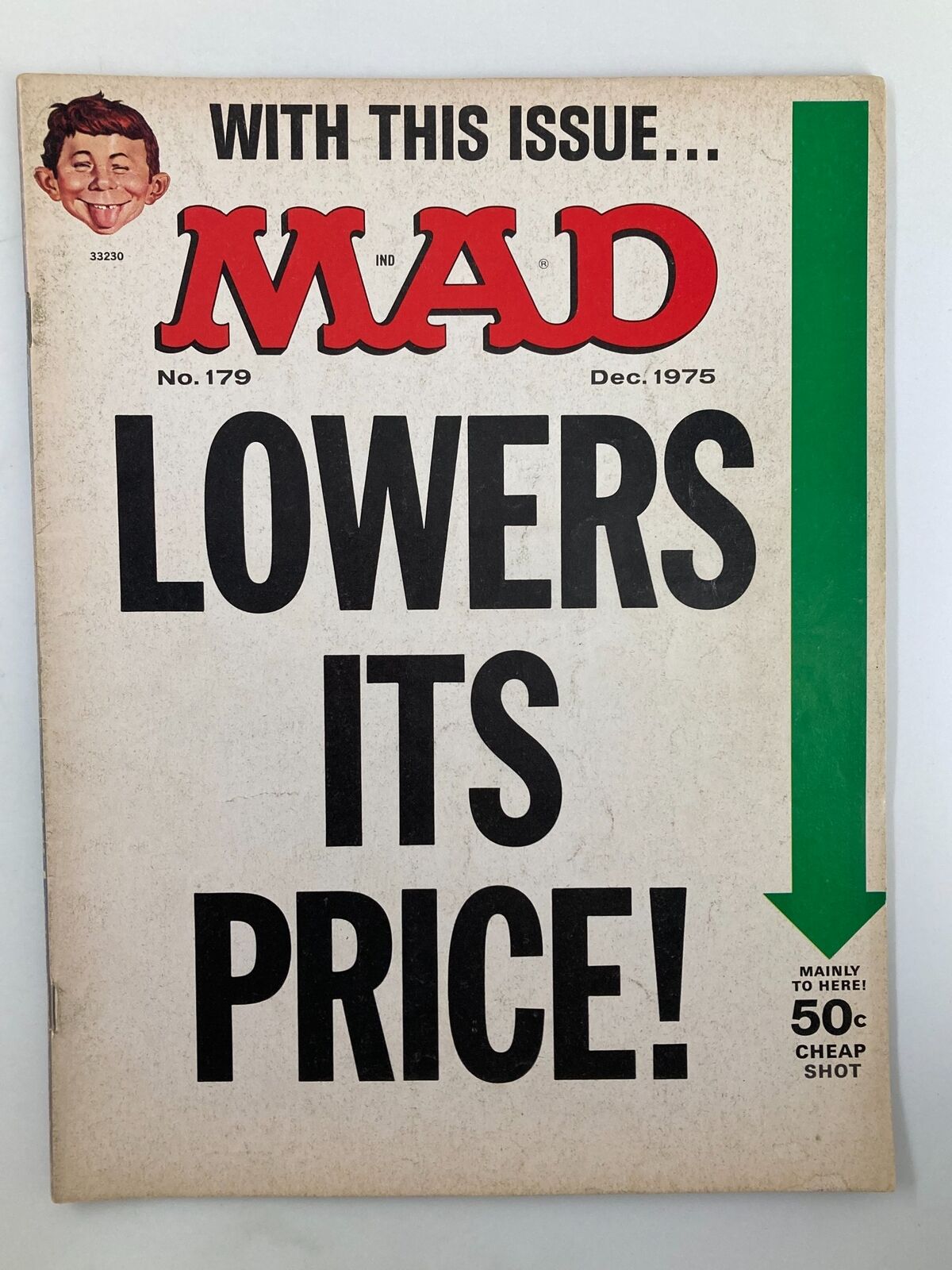 Cover of Mad Magazine December 1975, Issue No. 179 featuring bold black text that reads 'LOWERS ITS PRICE!' with a whimsical caricature character and an arrow indicating a price drop, embodying the humorous essence of vintage satire.