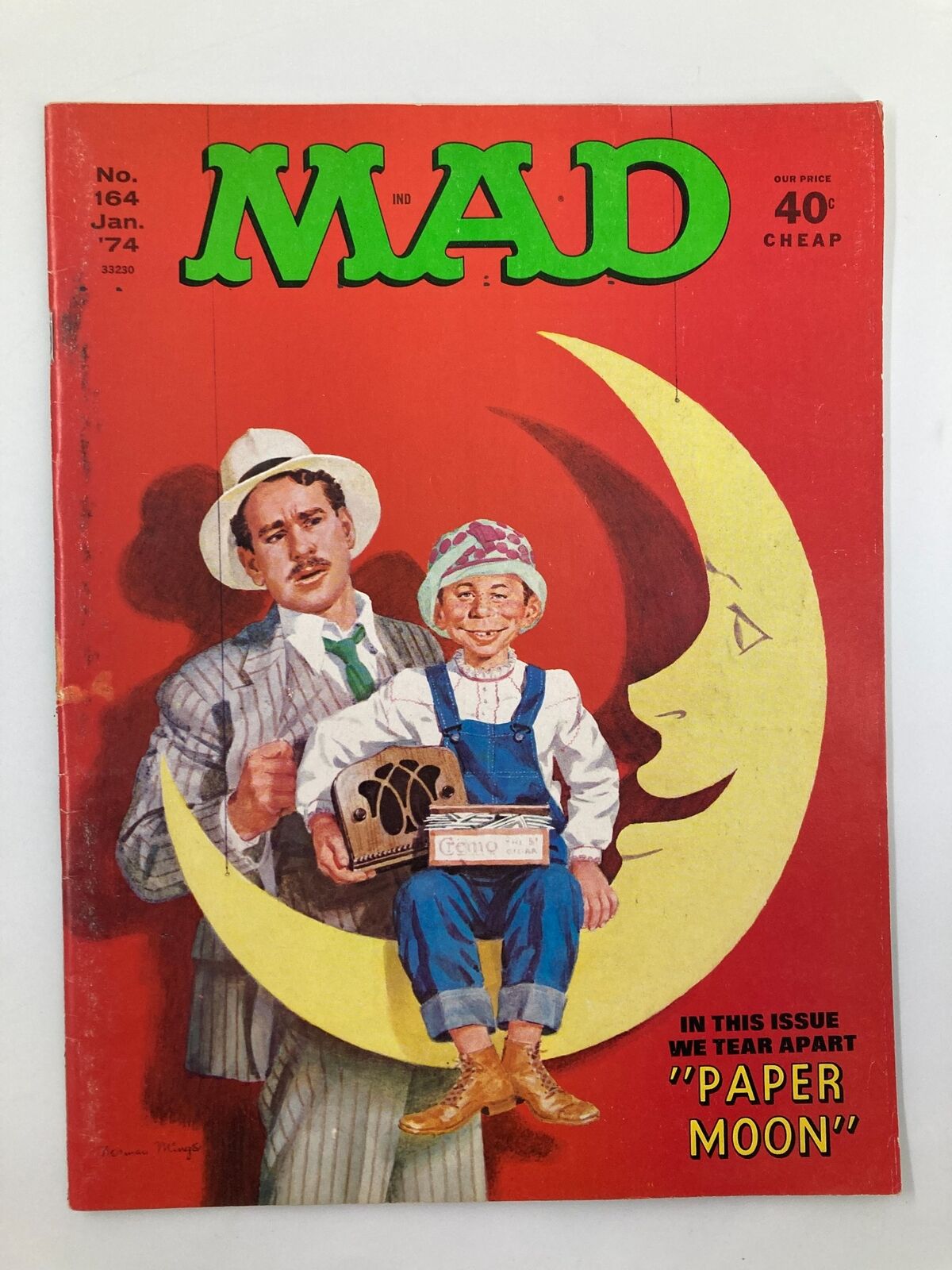 Cover of Mad Magazine January 1974 No. 164, titled 'Paper Moon', featuring colorful artwork with characters against a bright red background.