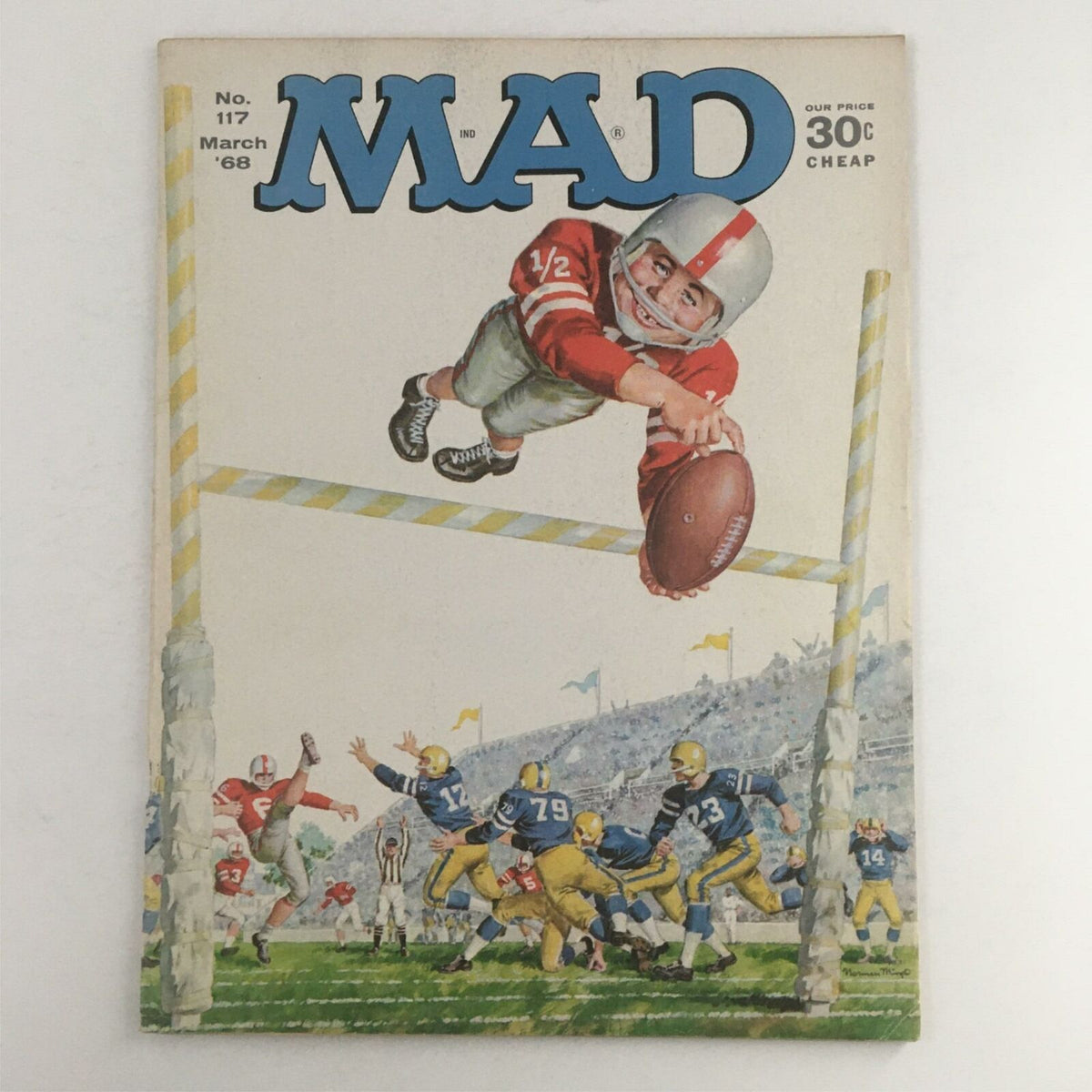 Cover of Mad Magazine March 1968 No. 117 featuring a humorous illustration of a football player diving to catch a ball, capturing the essence of 1960s comic humor.