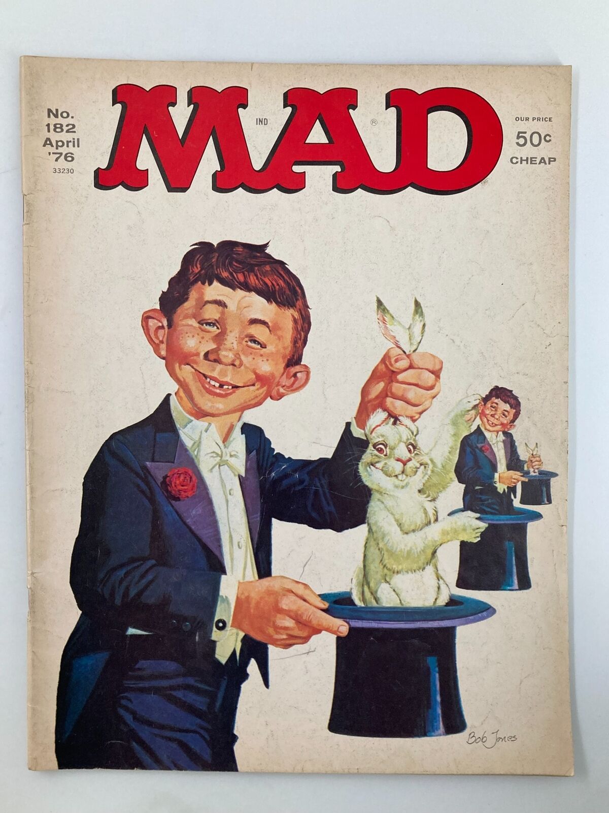 Cover of Mad Magazine April 1976 No. 182, featuring a whimsical illustration of Alfred The Magician performing a magic trick with a rabbit, showcasing vintage pop culture and humor.