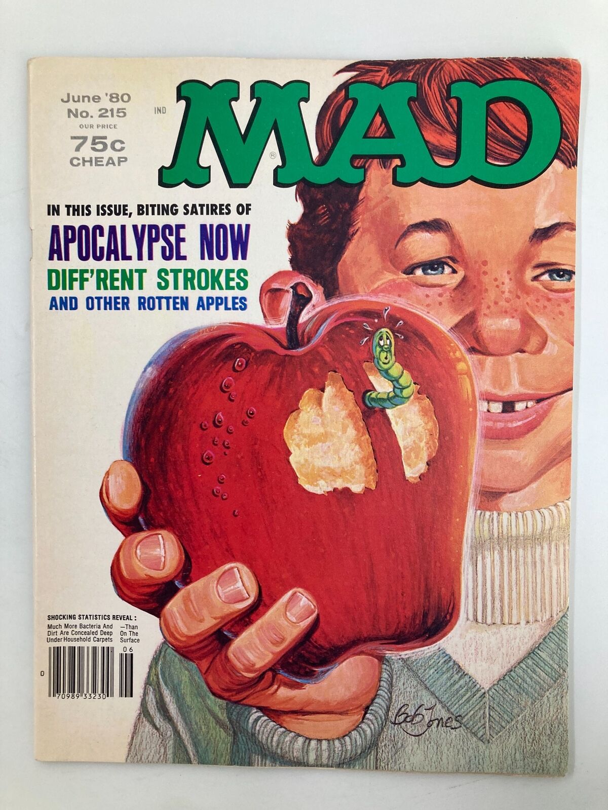 Cover of Mad Magazine June 1980 No. 215 featuring a boy holding a red apple with a caterpillar, showcasing biting satire on popular culture. Vintage collectible with the iconic 'Rotten Apples' theme.