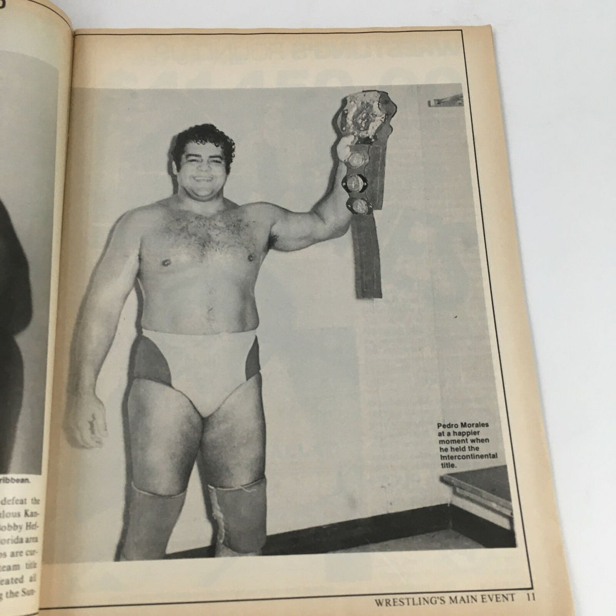 Wrestling's Main Event Magazine May 1983 page showcasing Pedro Morales holding an intercontinental championship belt, celebrating a significant wrestling achievement.