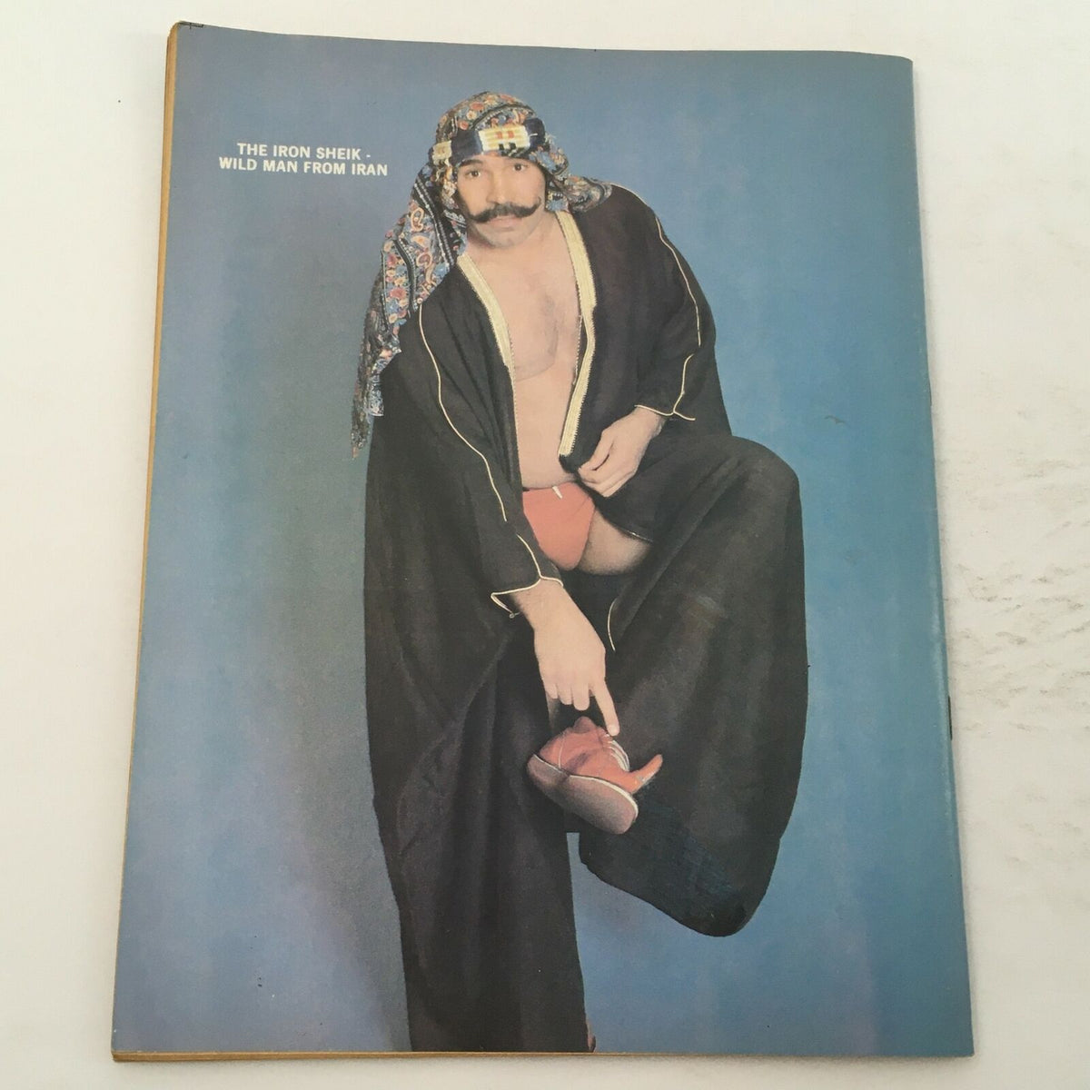 Cover of Wrestling Magazine #80, 1981 featuring The Iron Sheik in a traditional outfit, symbolizing the vibrant wrestling scene of its era.