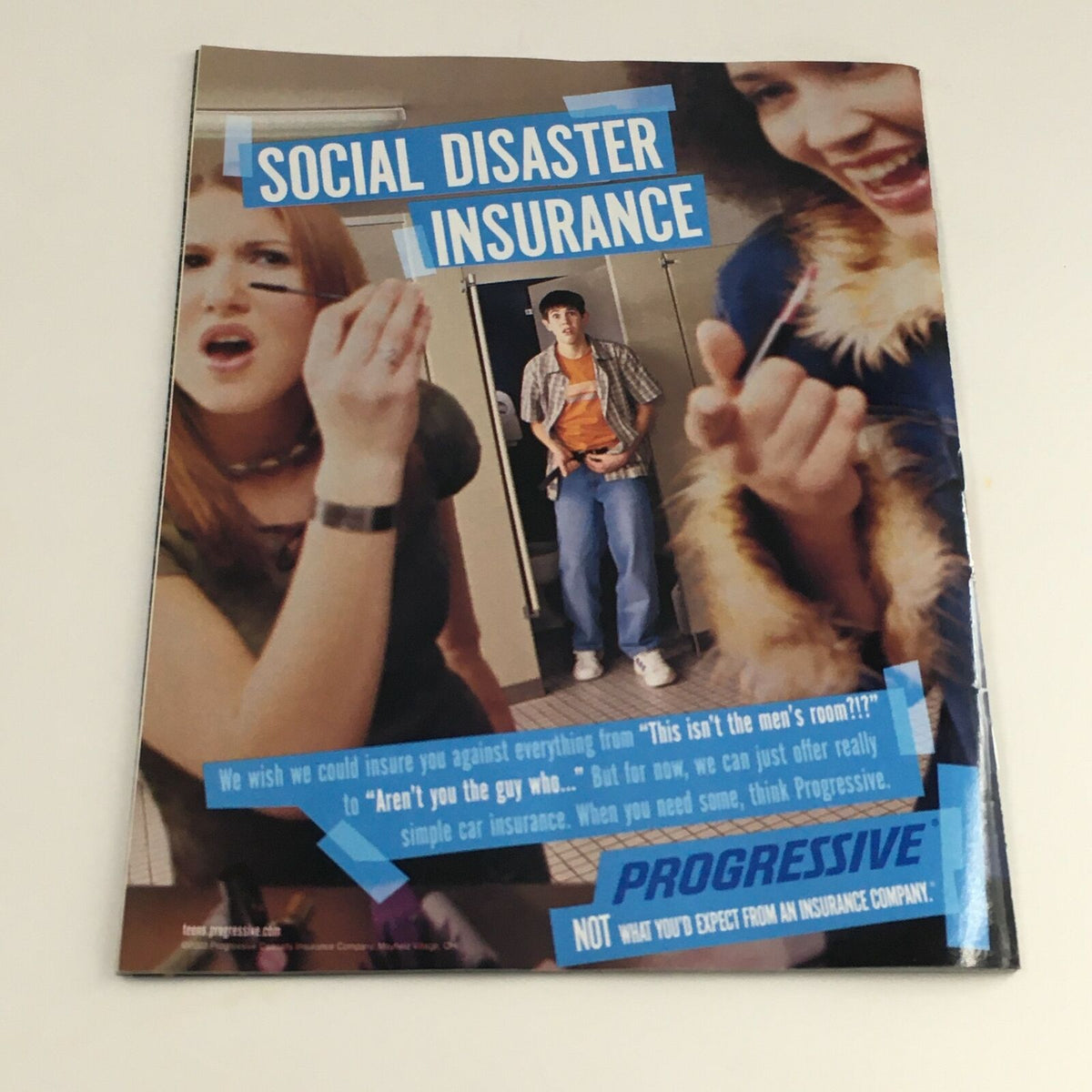 Advertisement from WWE Raw Magazine July 2003 titled 'Social Disaster Insurance', highlighting a humorous take on insurance with engaging visuals.
