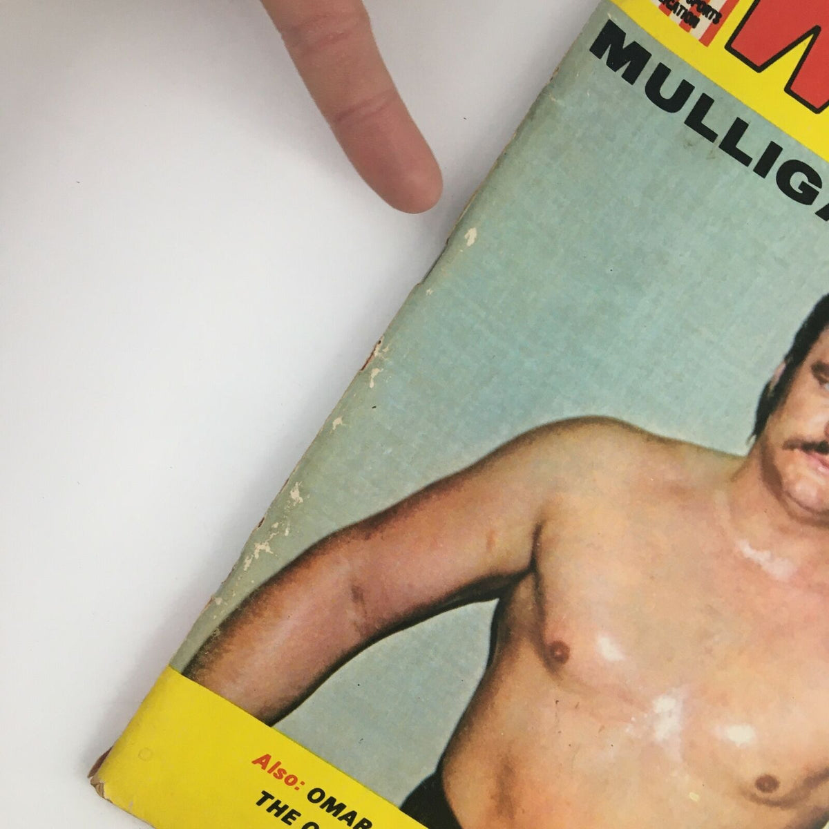 Close-up of the cover of Wrestling Revue Magazine July 1971 highlighting Blackjack Mulligan's image, with details on the magazine's vintage condition.
