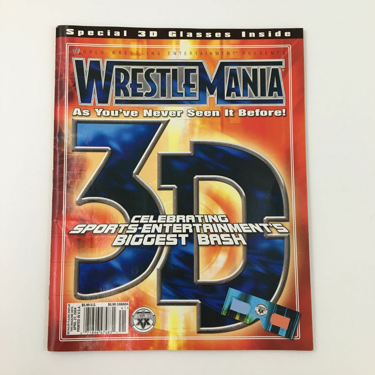 Cover of WWE Present 2004 Wrestle Mania magazine featuring colorful 3D design, highlighting Hulk Hogan vs Sid Justice.