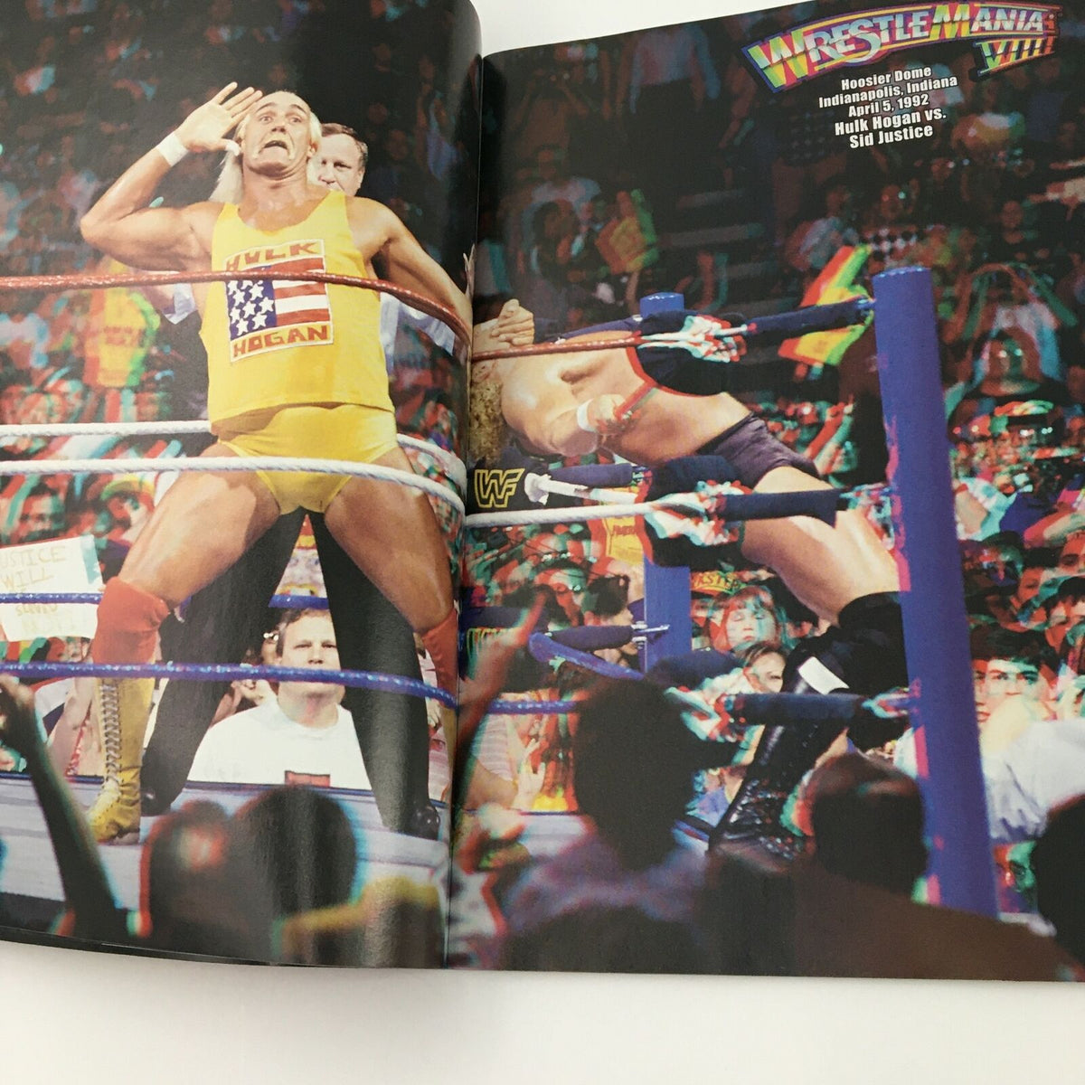 WWE Present 2004 Wrestle Mania image of Hulk Hogan in his iconic yellow attire against Sid Justice, capturing a pivotal moment in wrestling history.