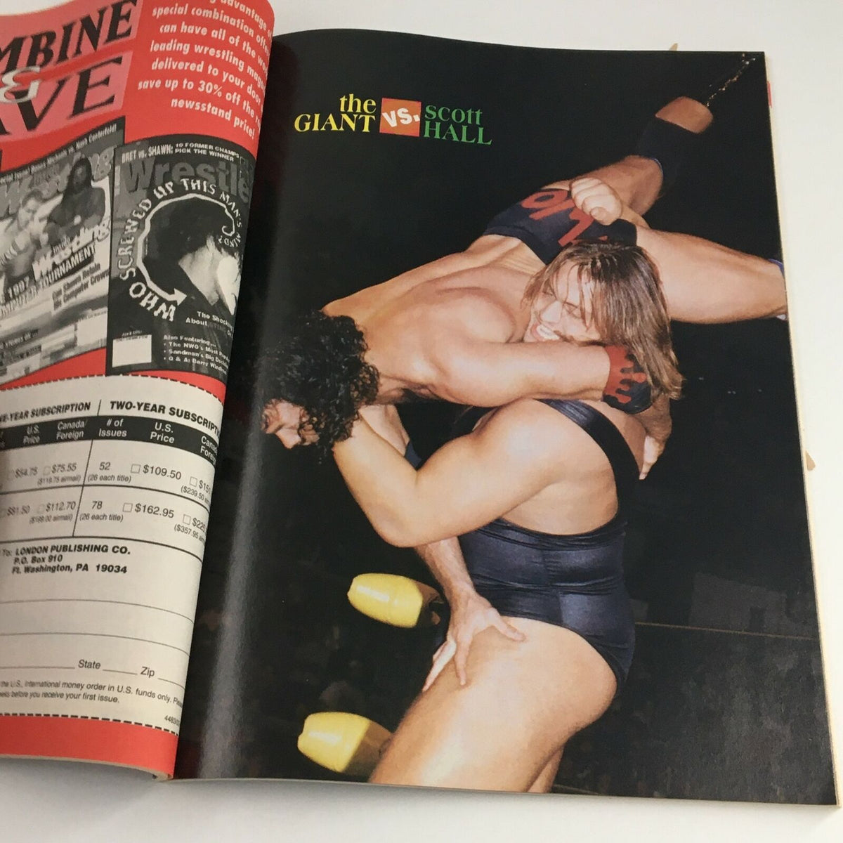 Image from Wrestling Yearbook Winter 1997 depicting the match between The Giant and Scott Hall, showcasing the thrilling action of wrestling.