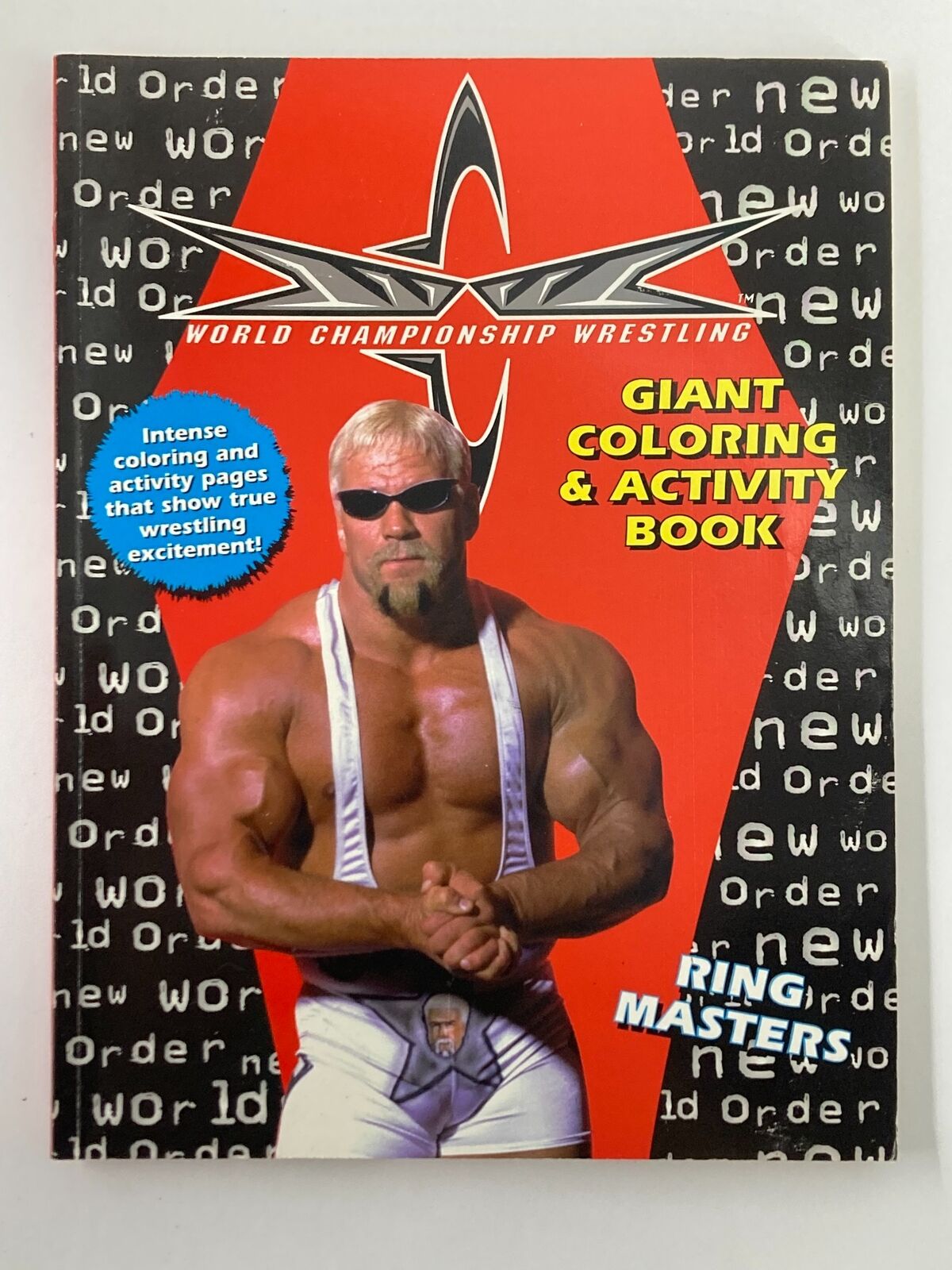 World Championship Wrestling Giant Coloring & Activity Book featuring a muscular wrestler on the cover, showcasing a vibrant design with the title prominently displayed.