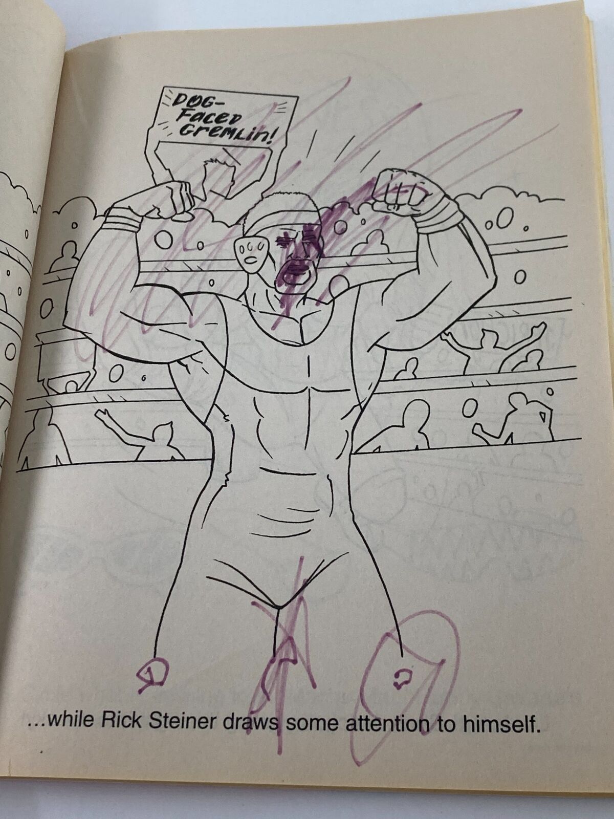 Another page from the World Championship Wrestling Giant Coloring & Activity Book, illustrating a wrestling scene with markers and doodles, depicting a wrestler with a sign.