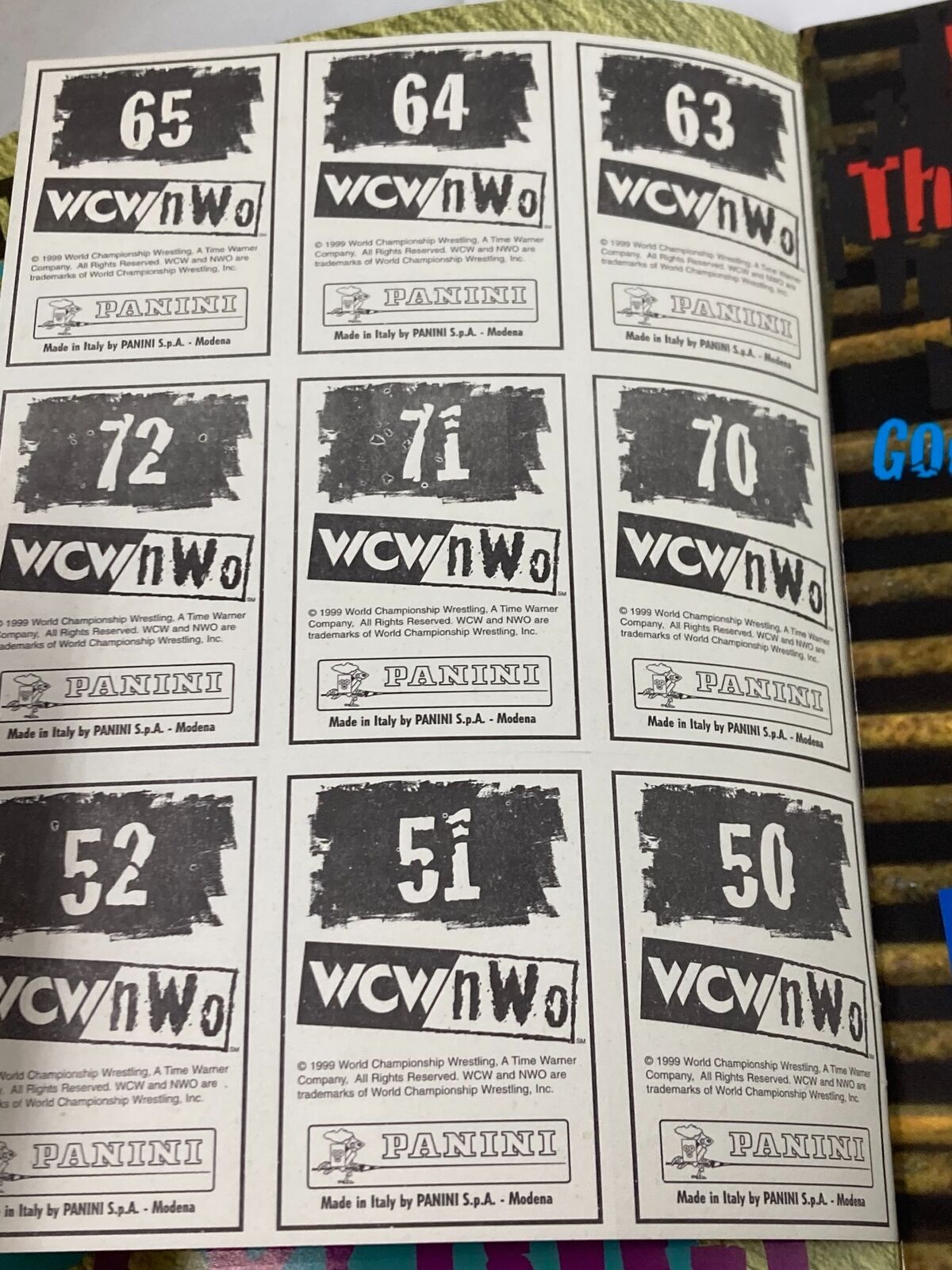 Page from the 1999 WCW and NWO Sticker Book highlighting sticker numbers from Panini with a black and white design.