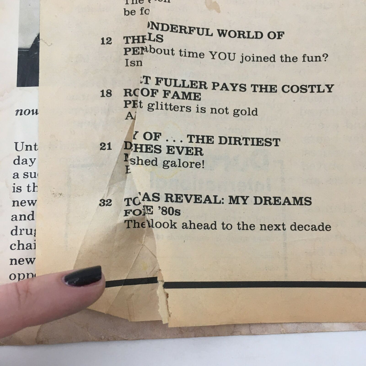 WWF Wrestling Magazine Spring 1980 - interior page showing partially torn text with article titles and descriptions related to professional wrestling memorabilia.