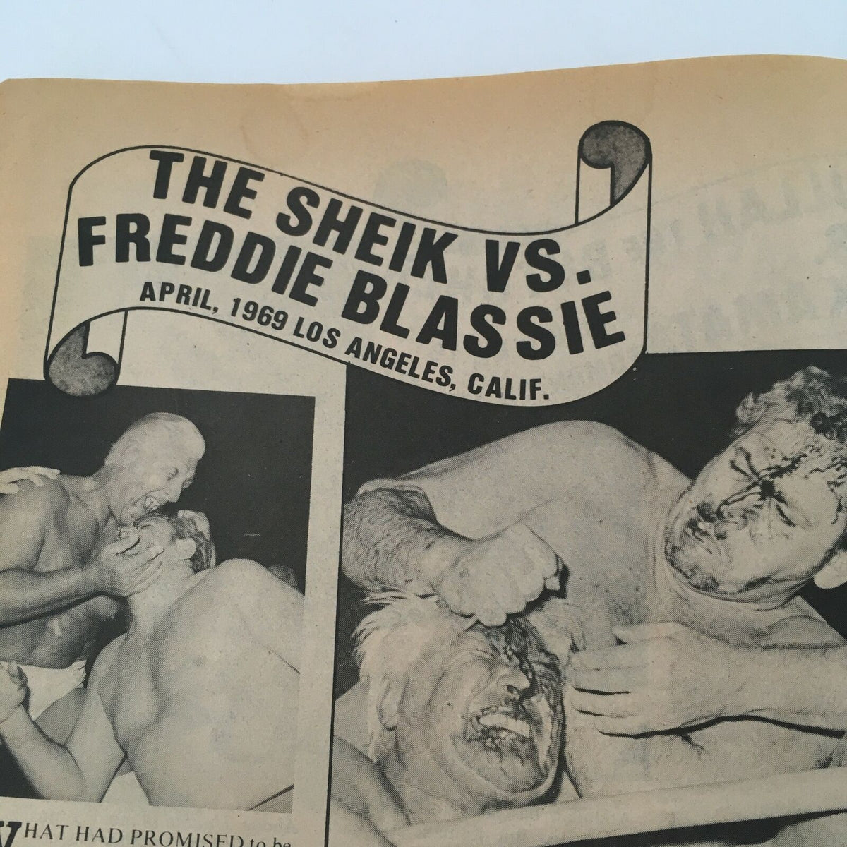 Vintage wrestling match photo of The Sheik vs. Freddie Blassie featured in WWF Wrestling Magazine Spring 1980, capturing iconic moments from wrestling history.