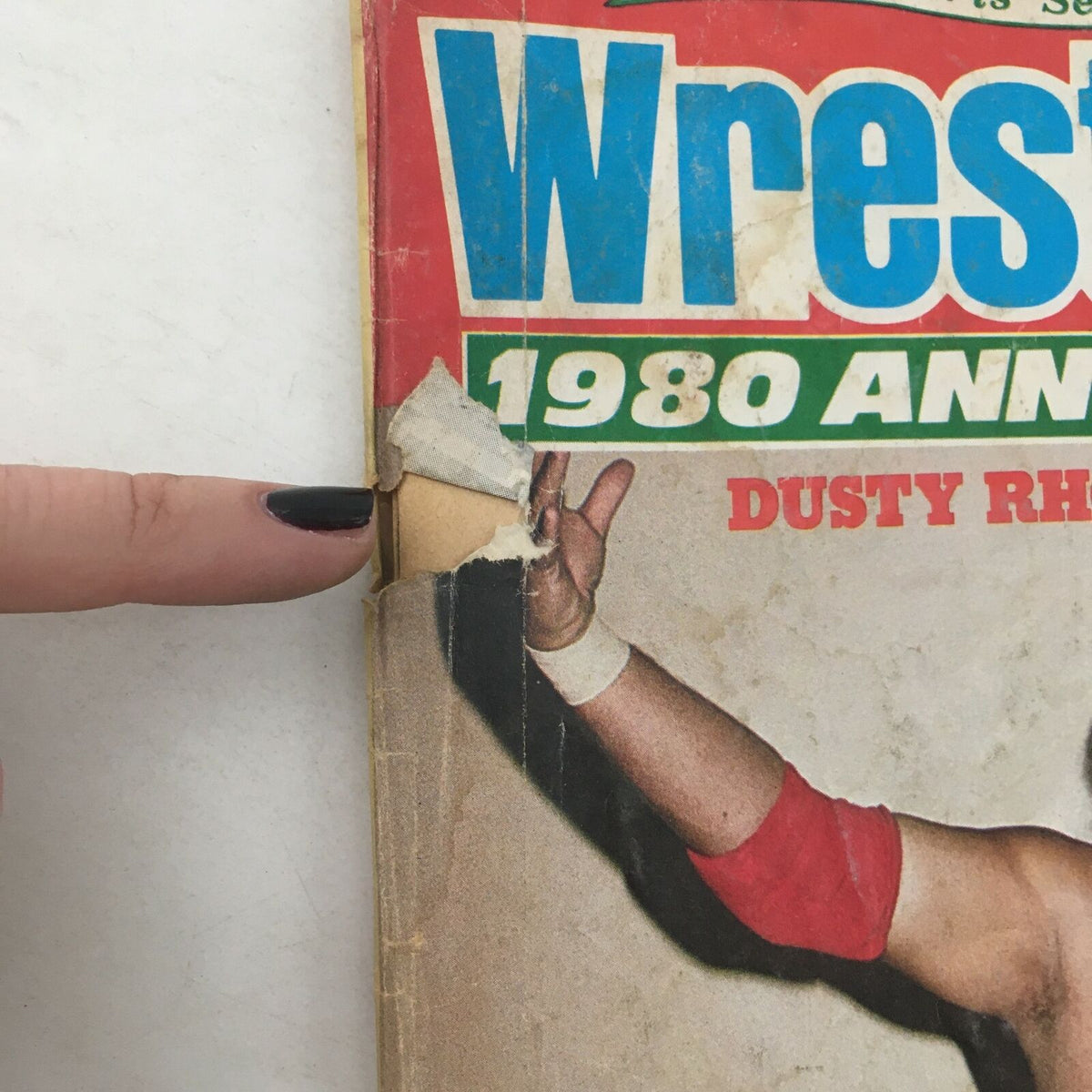 Image of the front cover of WWF Wrestling Magazine Spring 1980 highlighting Dusty Rhodes, with visible wear and tear indicative of its vintage condition.