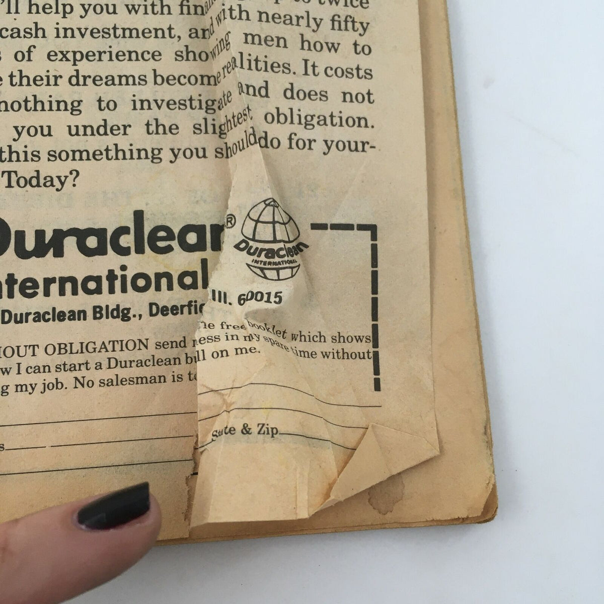 Image of a page from WWF Wrestling Magazine Spring 1980 presenting an advertisement related to Duraclean services, reflecting the advertising style of the era.