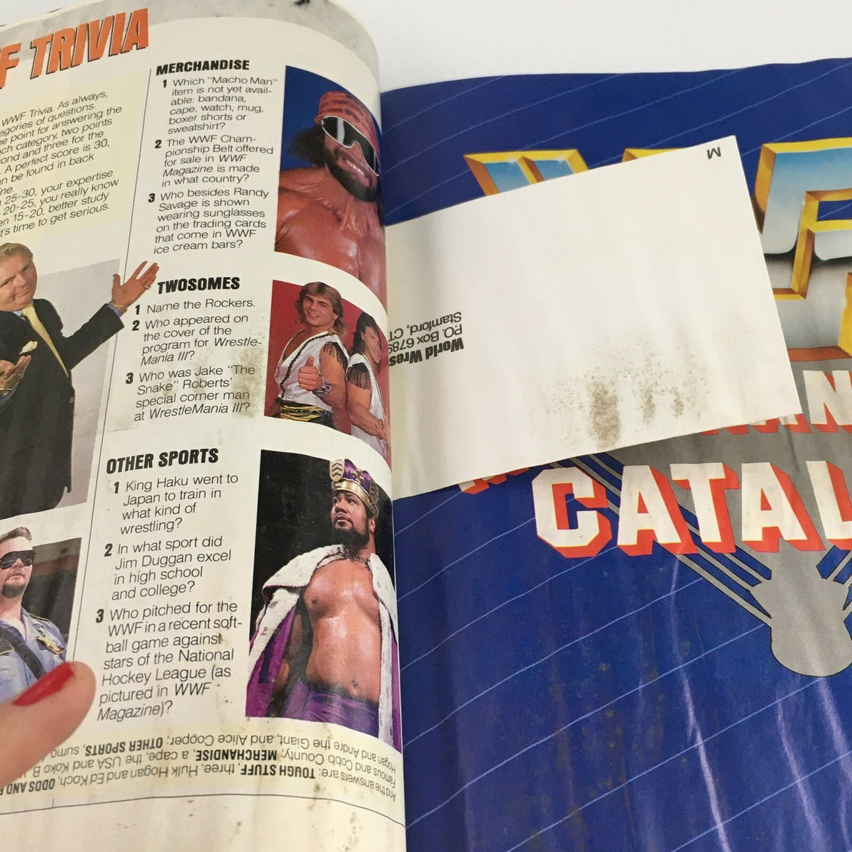 Inside page of WWF Magazine January 1989 displaying trivia questions and images of classic wrestling personalities, a nostalgic glimpse into wrestling culture.