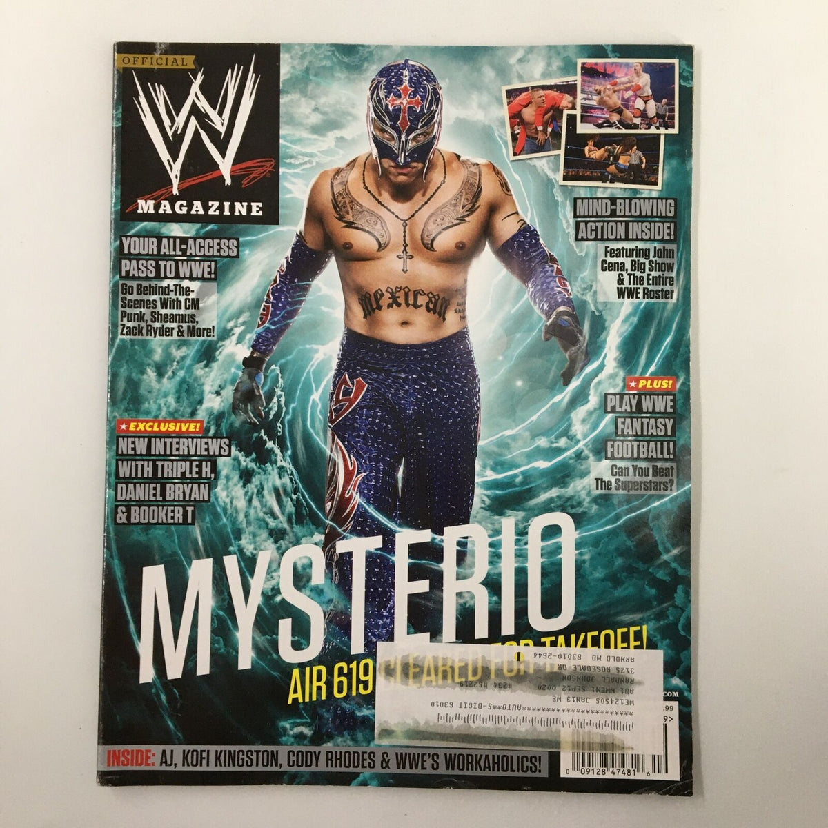 WWE Magazine September 2012 cover featuring Rey Mysterio in a colorful costume with wrestling graphics, highlighting iconic wrestlers including Triple H, Daniel Bryan, and Booker T.