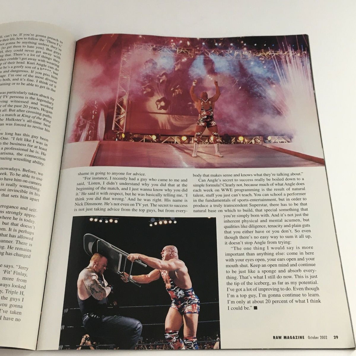WWE Raw Magazine October 2002 featuring action shot of a wrestling match and iconic stars backstage, including Kurt Angle and Jeff Hardy, showcasing the electrifying wrestling atmosphere of the early 2000s.