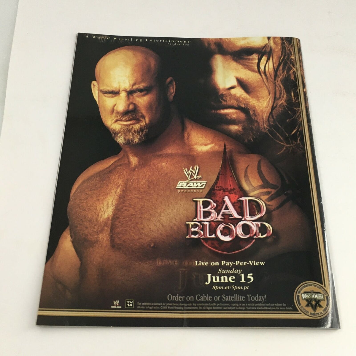 Promotional page from WWE Raw Magazine June 2003 depicting Bill Goldberg, with a focus on the upcoming Bad Blood Pay-Per-View event.