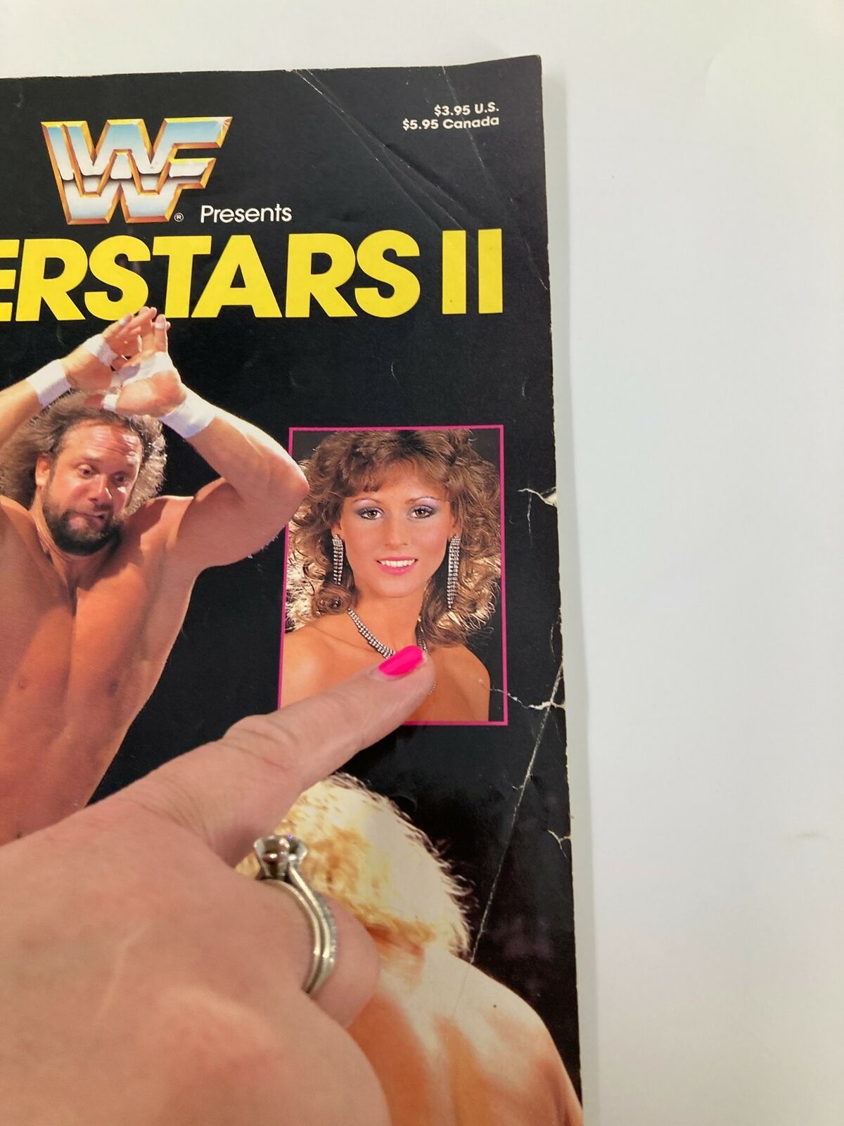 The World Wrestling Federation Presents Superstars II 1987 featuring an image of a wrestler and a pointing finger on the front cover.