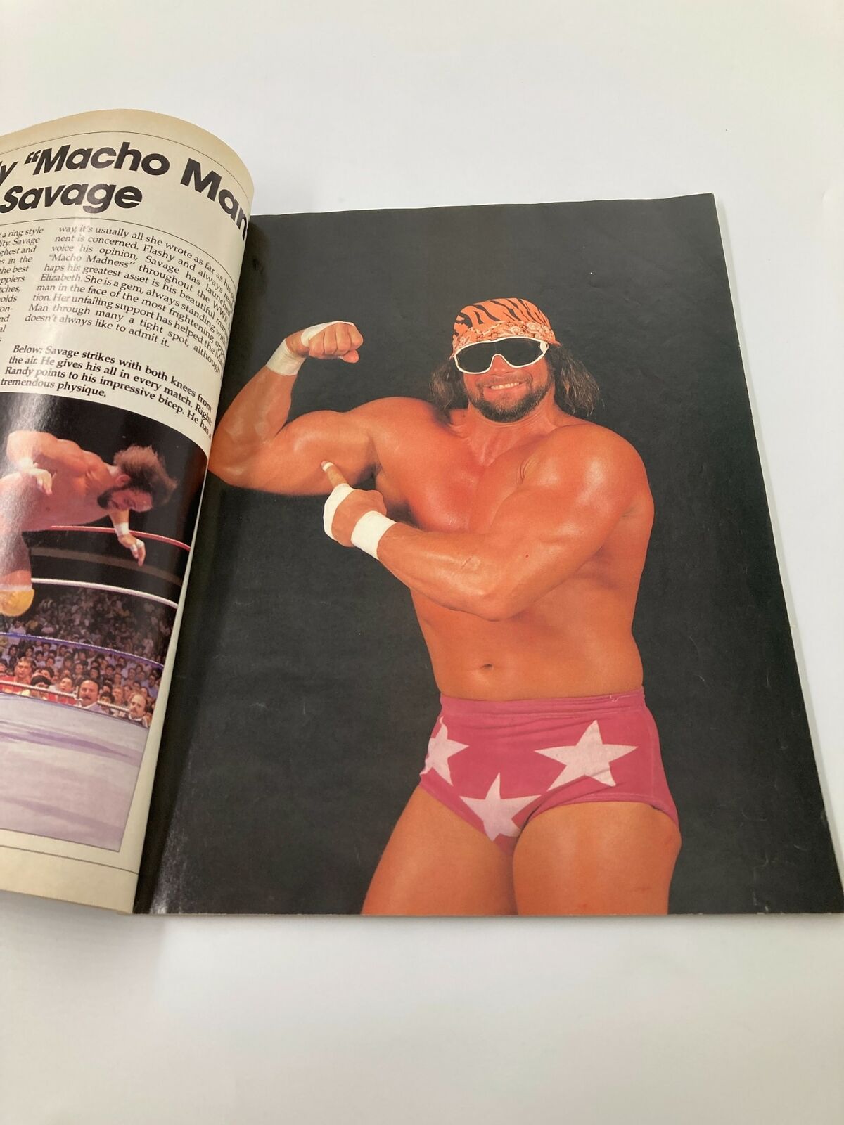 Image from 'The World Wrestling Federation Presents Superstars II 1987 Hulk Hogan' featuring Macho Man Randy Savage flexing his muscles, dressed in iconic star-patterned trunks, epitomizing the colorful personalities of 1980s wrestling.