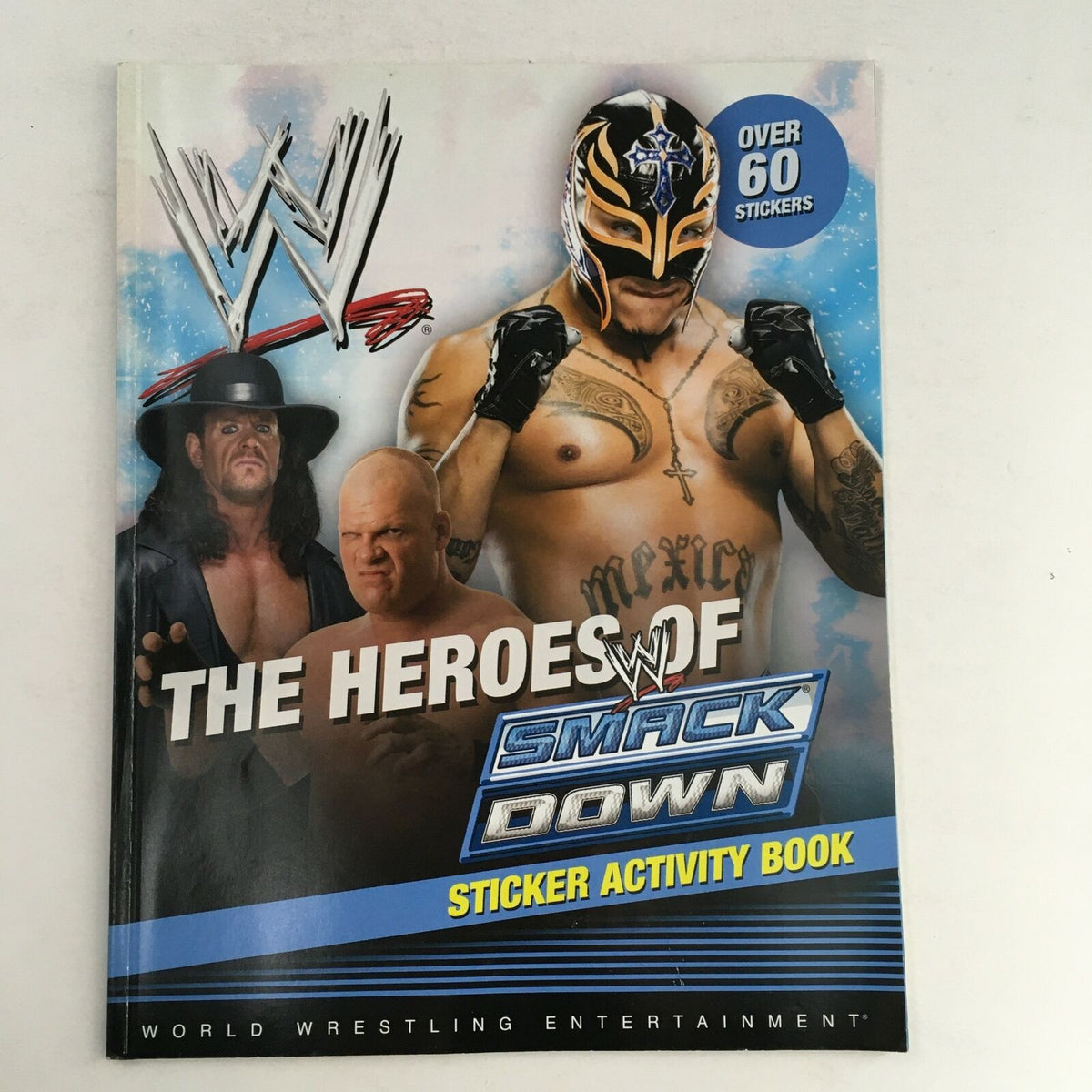 WWE Sticker Activity Book featuring The Heroes of Smack Down, including iconic wrestlers like The Undertaker and Rey Mysterio. The cover highlights over 60 stickers available.