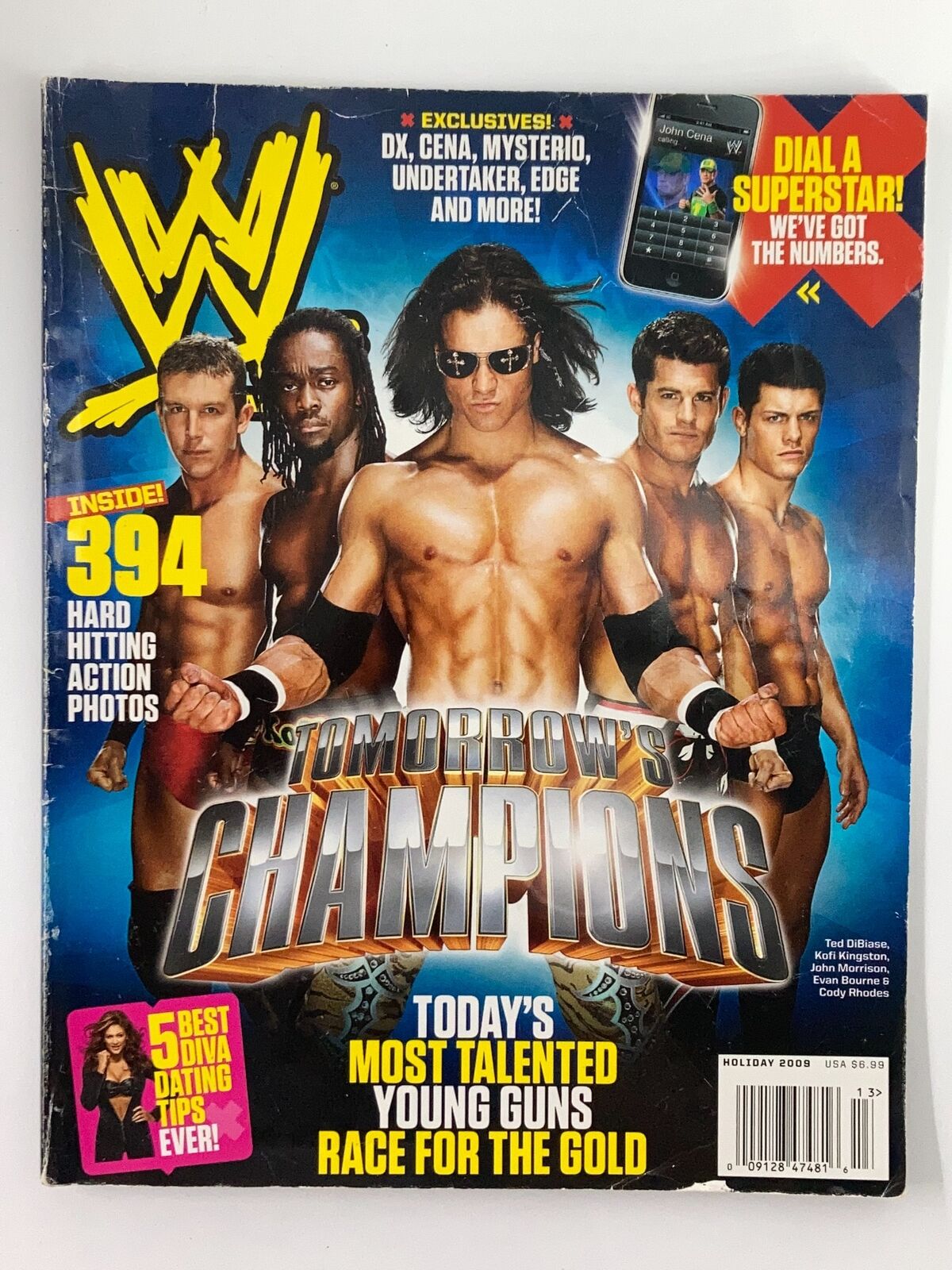 WWE Magazine Holiday 2009 cover featuring Ted DiBiase, Kofi Kingston, and John Morrison with the title 'Tomorrow's Champions' and exciting wrestling visuals.