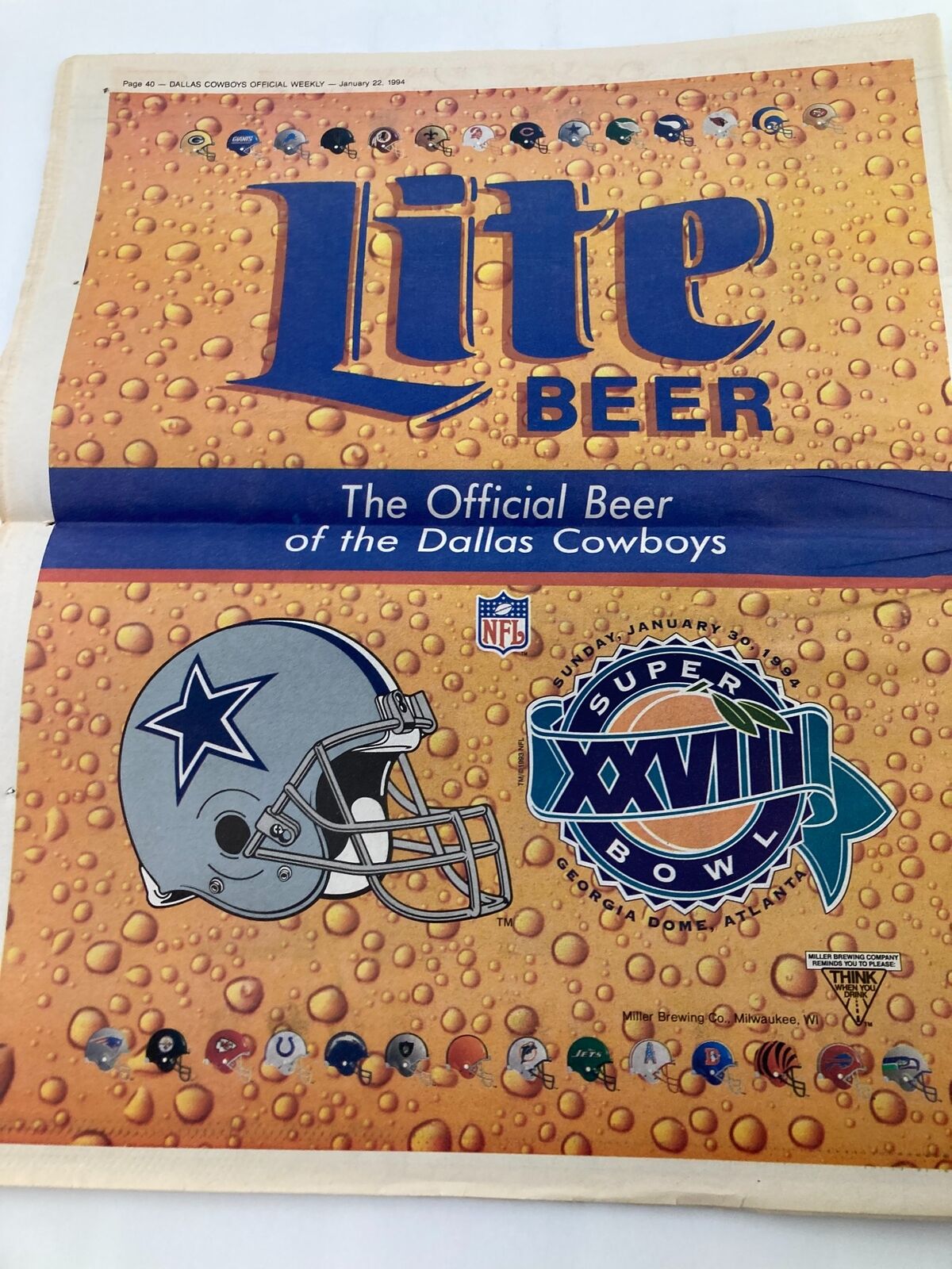 Dallas Cowboys Weekly Newspaper January 22 1994 Vol 19 #31 Alvin Harper showcasing an advertisement for Lite Beer, the Official Beer of the Dallas Cowboys, with a Super Bowl logo.