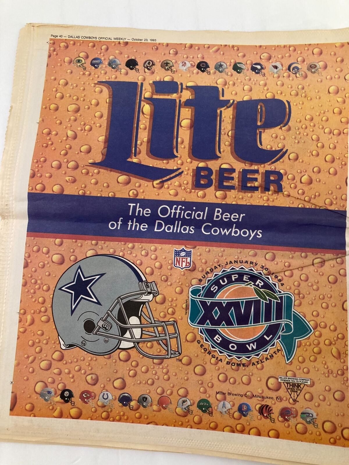 Advertisement from Dallas Cowboys Weekly Newspaper October 23 1993 Vol 19 #18 featuring Lite Beer, branded as the Official Beer of the Dallas Cowboys, with a Dallas Cowboys helmet and Super Bowl XXVIII logo.