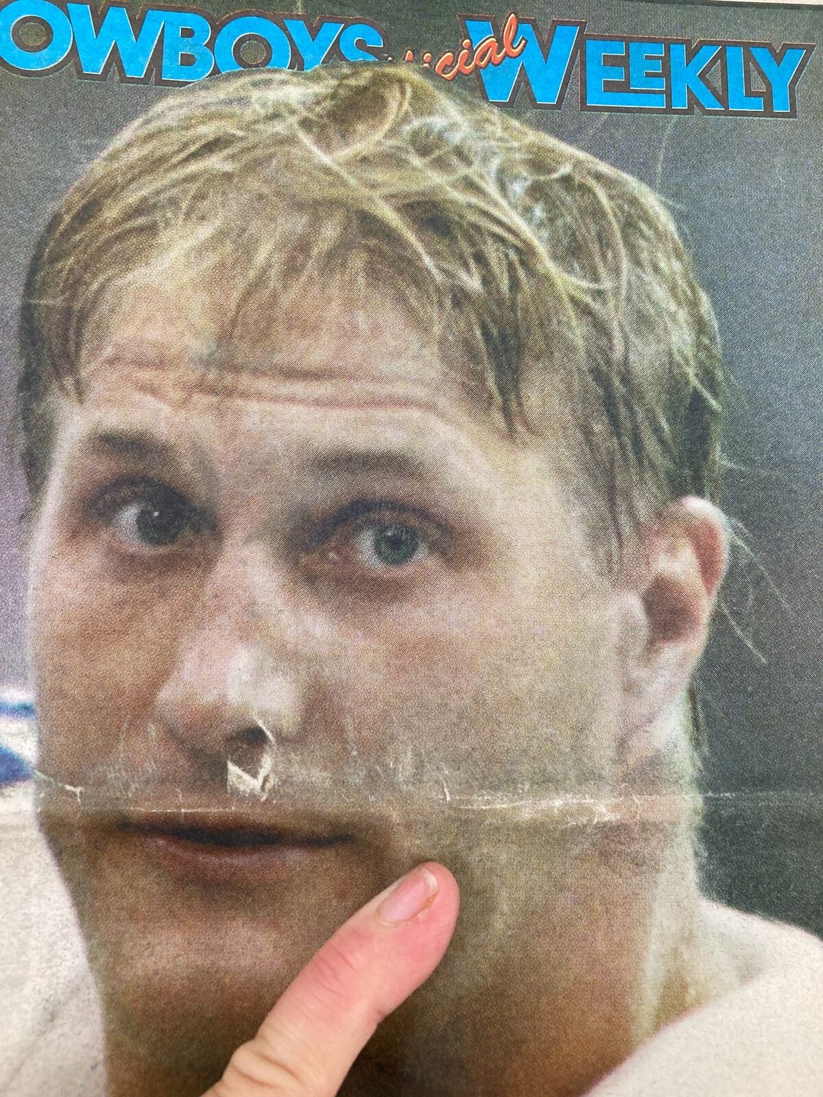 Close-up of Chad Hennings on the cover of Dallas Cowboys Weekly Newspaper July 19, 1997, Vol 23 #6, highlighting his facial expression and features.