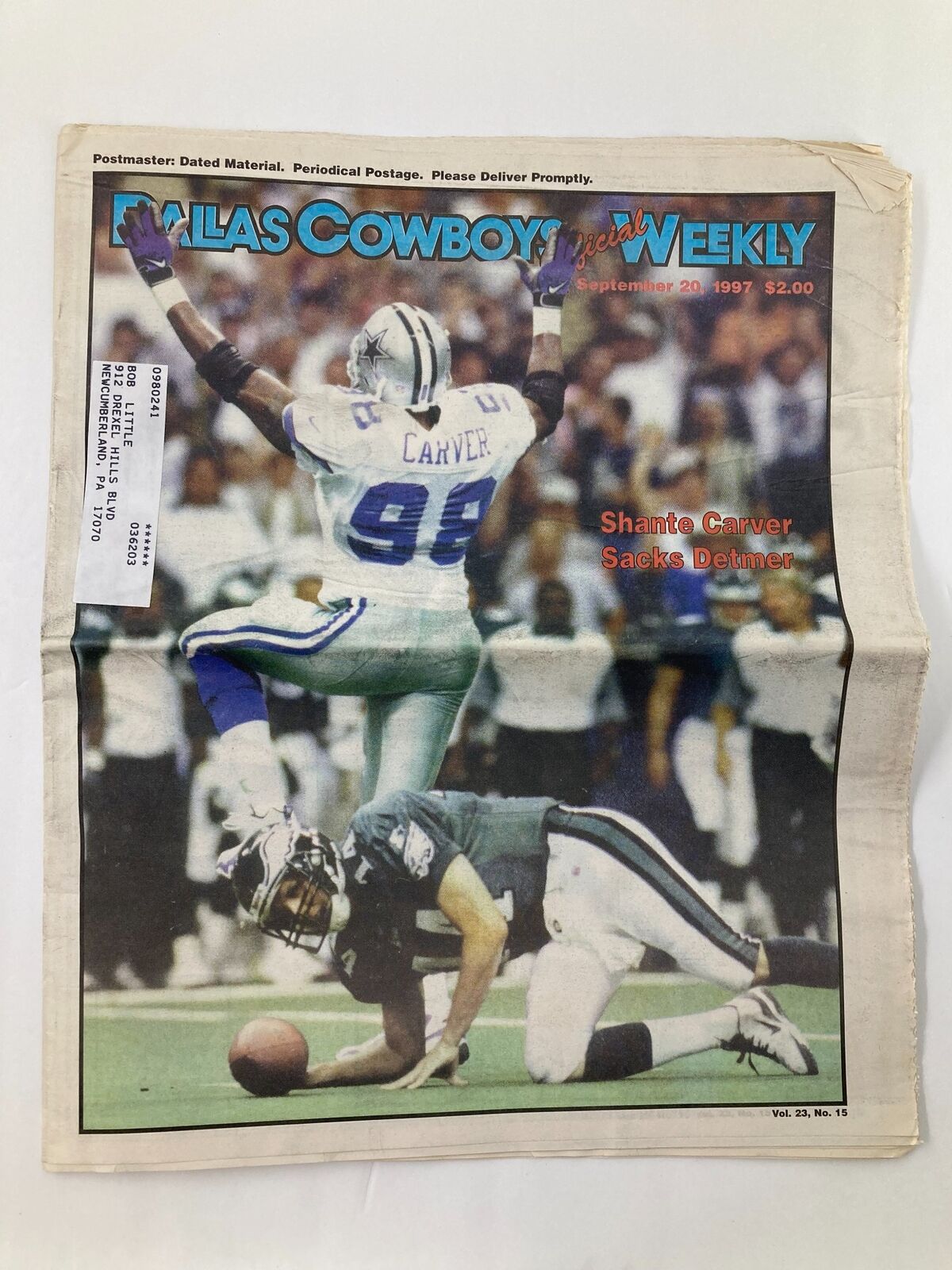 Dallas Cowboys Weekly Newspaper September 20 1997 Vol 23 #15 featuring Shante Carver celebrating a sack against Detmer, showcasing vibrant colors and action from the game.