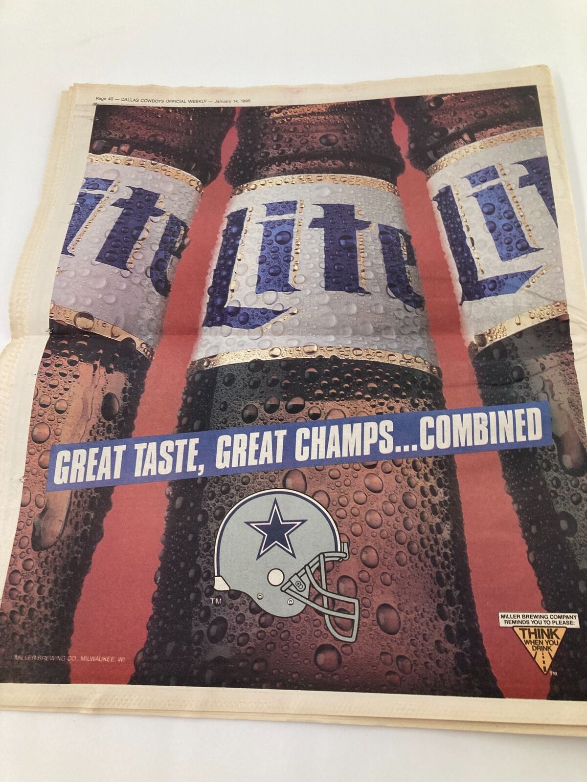 Dallas Cowboys Weekly Newspaper January 14 1995 Vol 20 #31 Troy Aikman, featuring a beer advertisement with the slogan 'Great Taste, Great Champs... Combined' alongside images of cold beer cans with condensation.