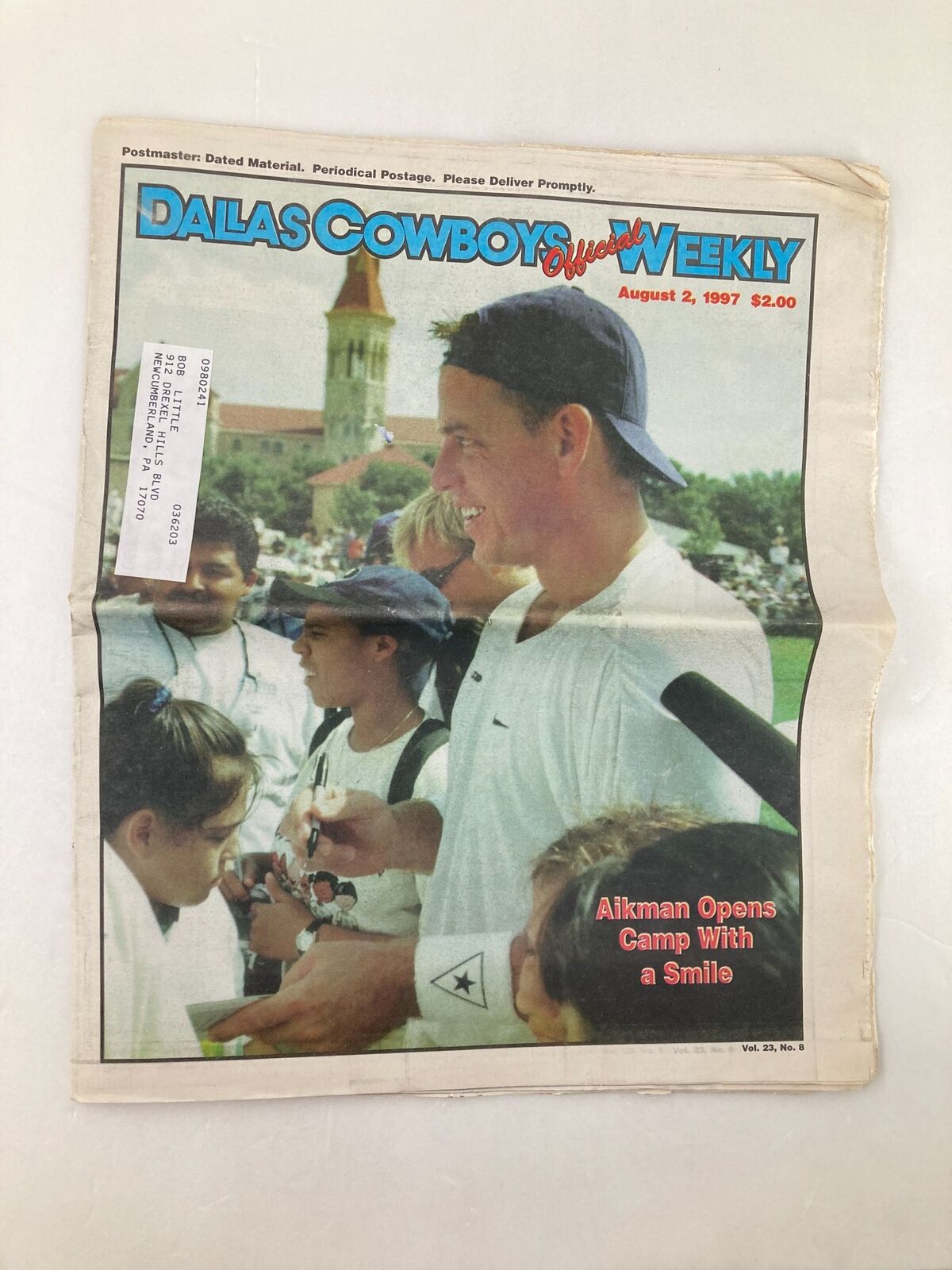 Dallas Cowboys Weekly Newspaper August 2 1997 Vol 23 #8 featuring Troy Aikman opening camp, with a smiling player signing autographs for fans.