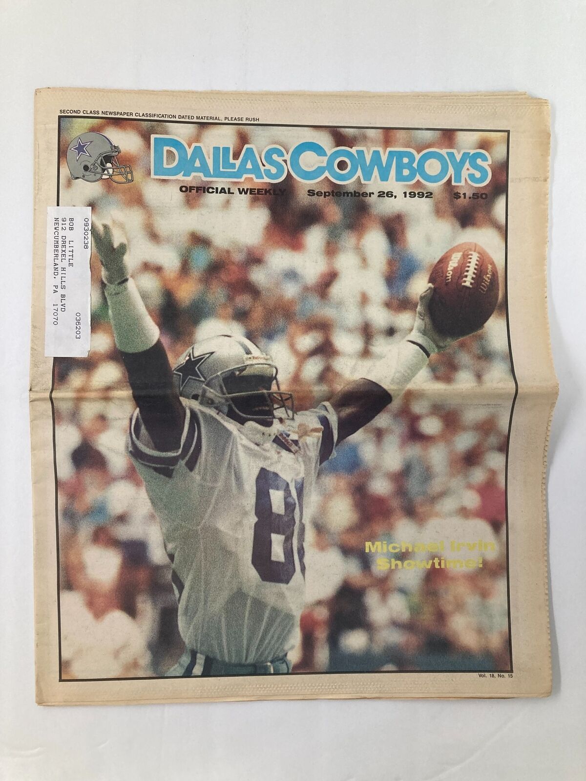 Cover of the Dallas Cowboys Weekly Newspaper, September 26, 1992, Vol 18 #15 featuring Michael Irvin celebrating with a football, highlighting a pivotal moment in NFL history.