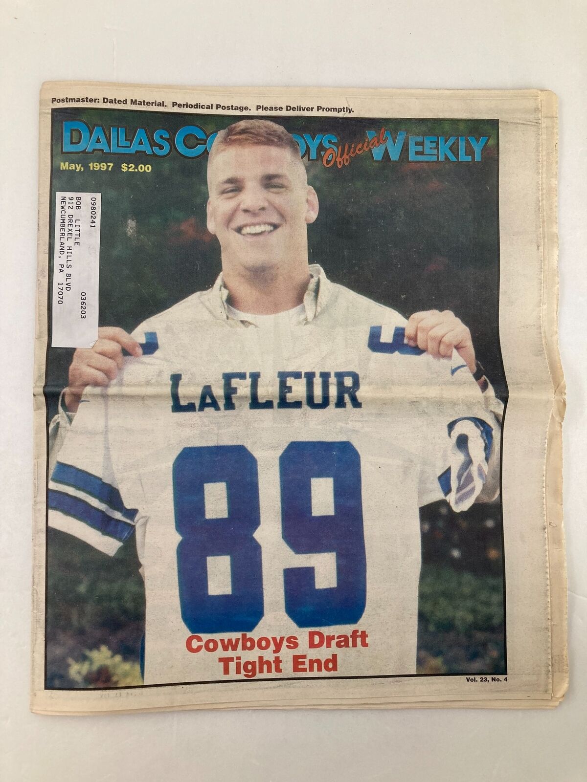 Dallas Cowboys Weekly Newspaper May 1997 Vol 23 #4 David LaFleur featuring player David LaFleur smiling and holding his jersey with number 89, highlighting his role as a Cowboys draft tight end.