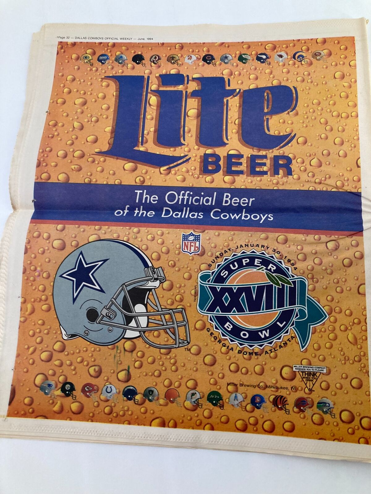 Lite Beer advertisement featuring the official beer of the Dallas Cowboys, related to Super Bowl XXVIII, from the Dallas Cowboys Weekly Newspaper June 1994 Vol 20 #5 Michael Irvin.